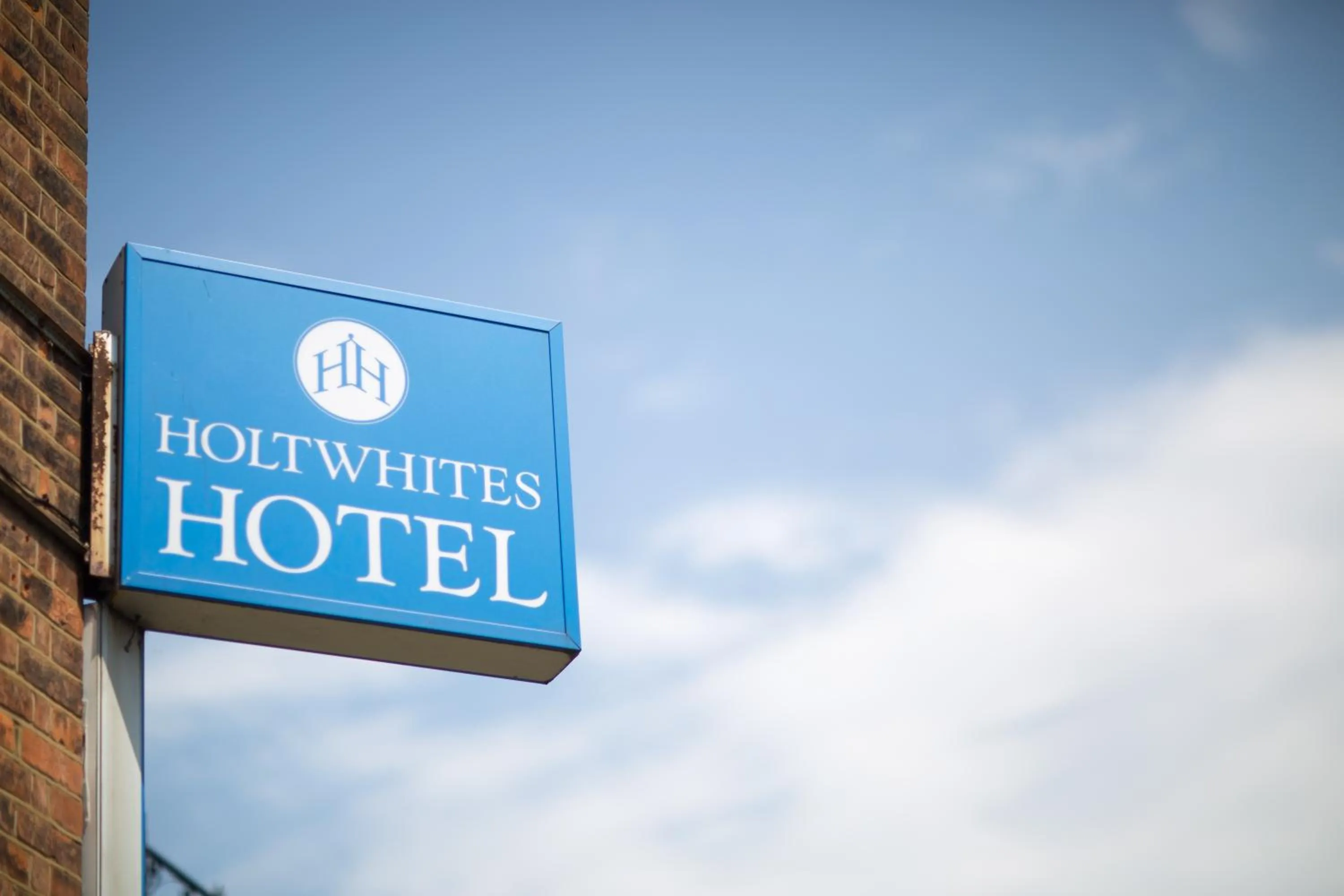 Property logo or sign in Holtwhites Hotel