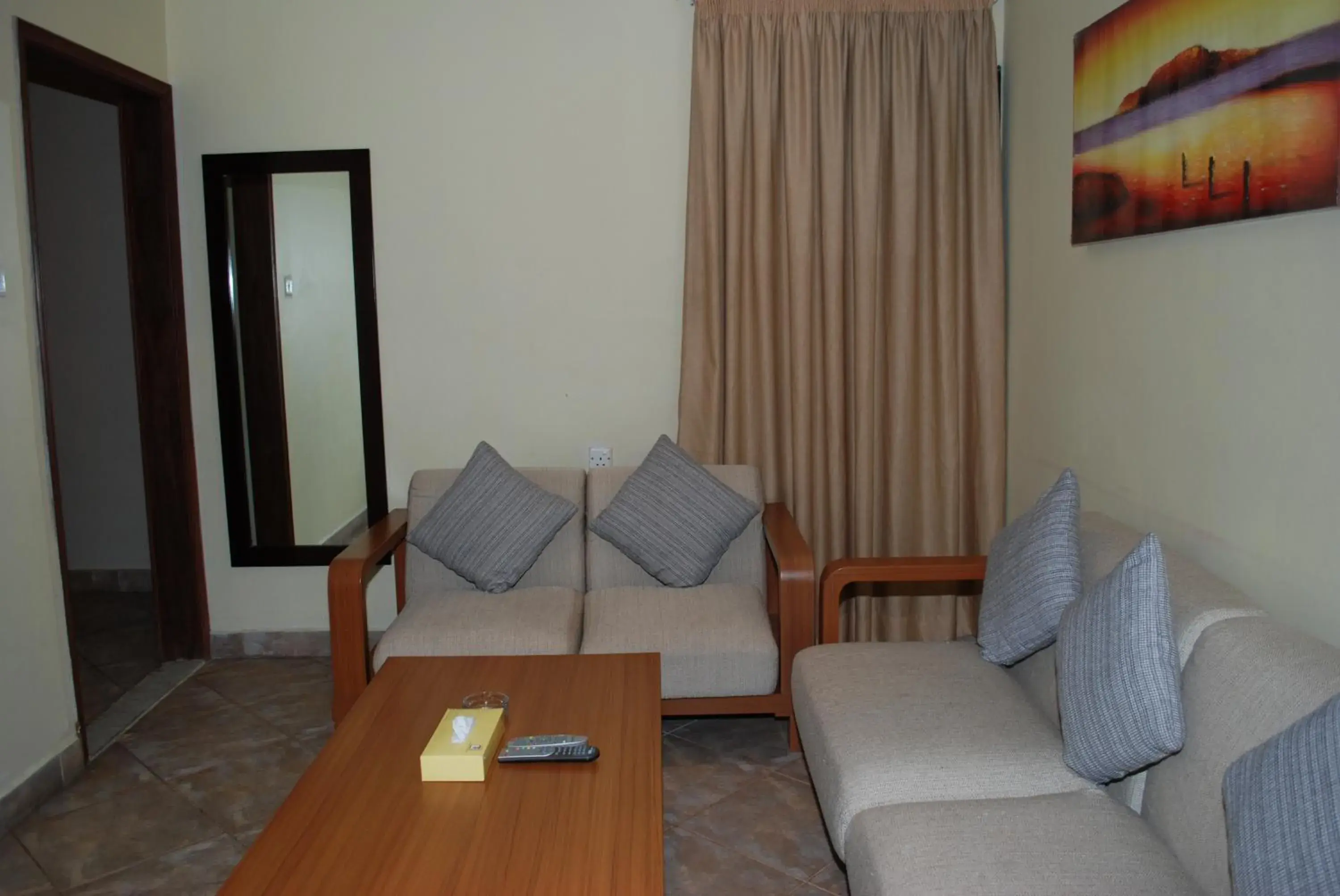 Living room, Seating Area in Times Square Suite Hotel