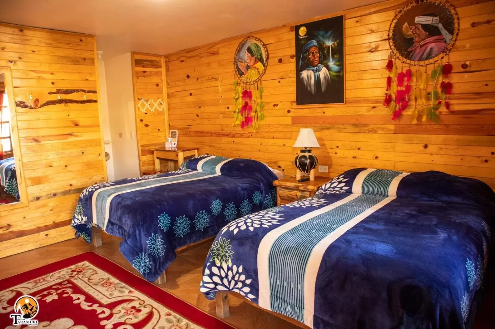 Bed in TARAMURI HOTEL & TOURS