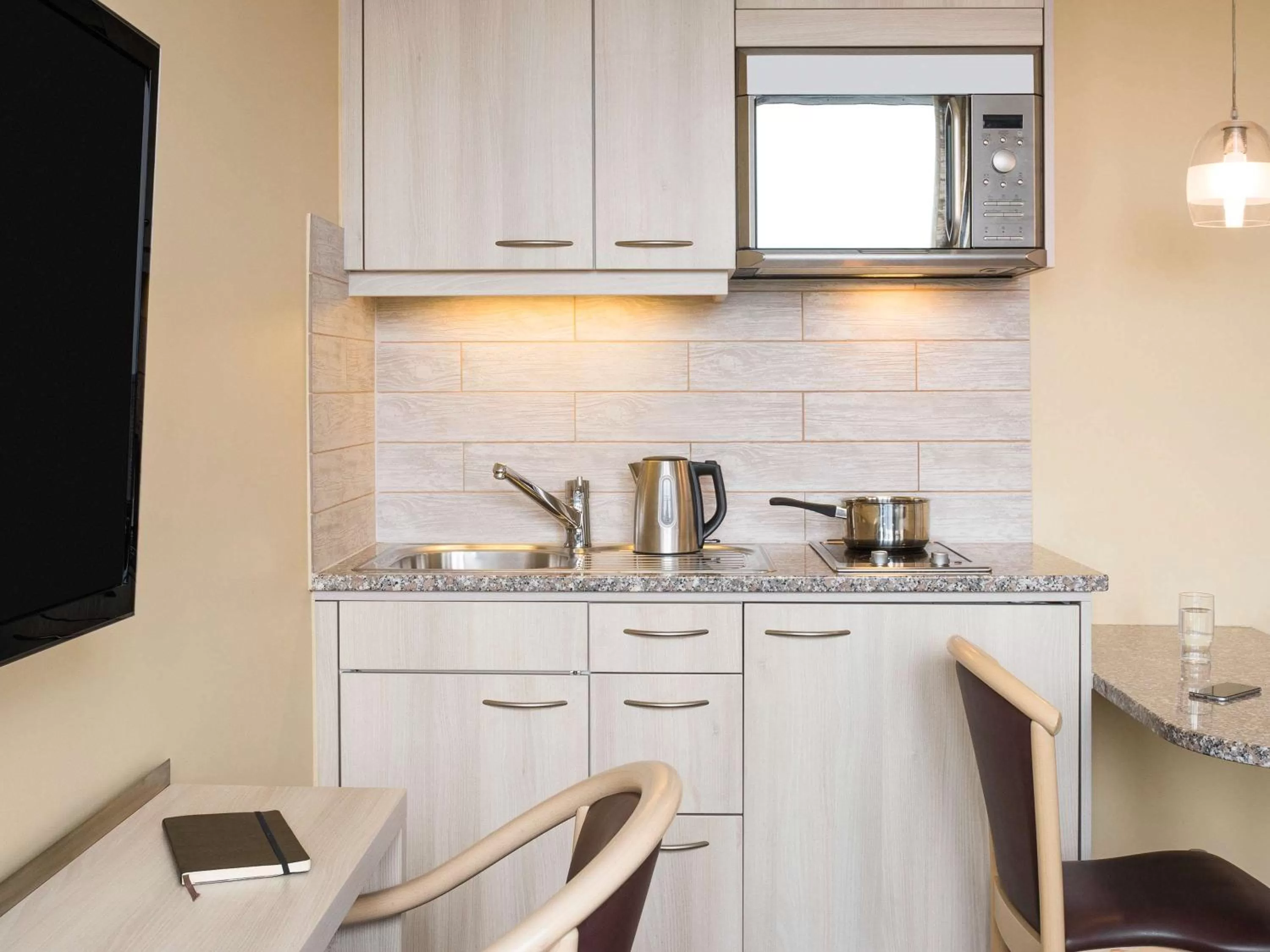 Photo of the whole room in Aparthotel Adagio Genève Mont-Blanc