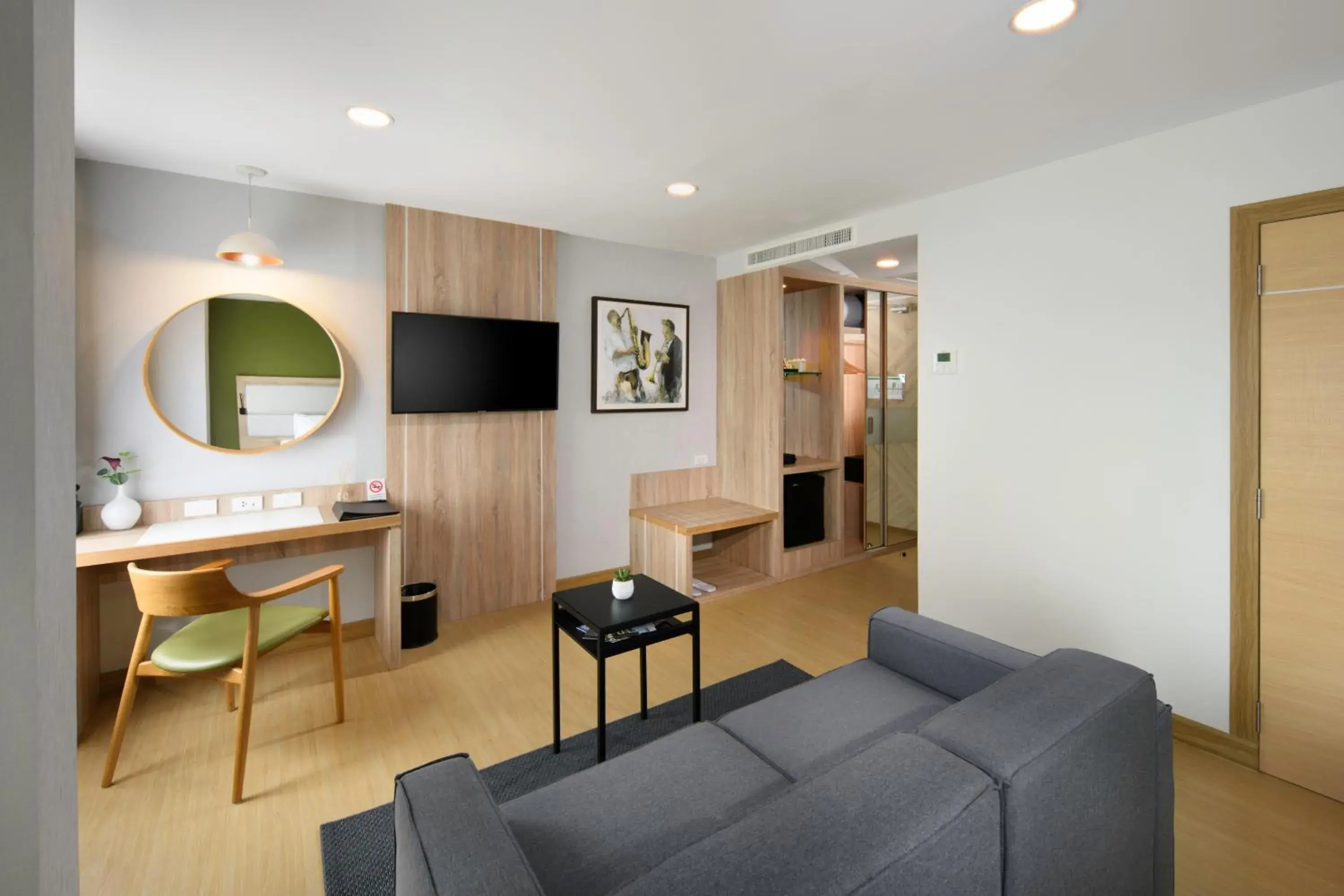 Bedroom, Seating Area in Prime Square Hotel