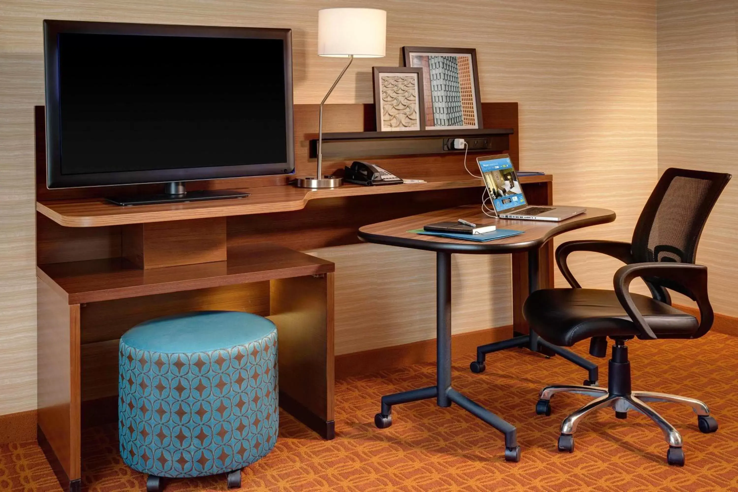 Photo of the whole room, TV/Entertainment Center in Fairfield Inn & Suites Lincoln Crete