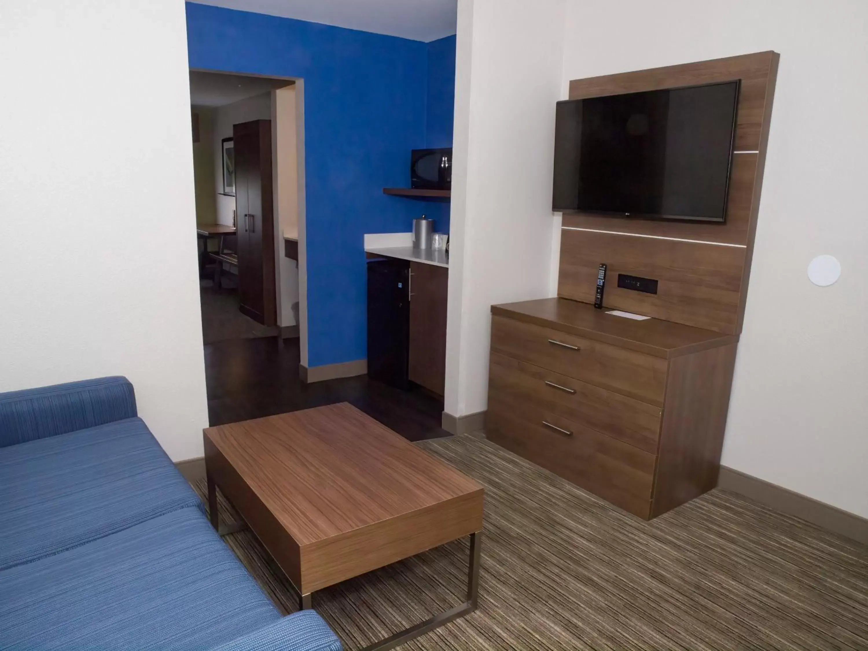 Photo of the whole room, TV/Entertainment Center in Holiday Inn Express Hotel & Suites Madison, an IHG Hotel