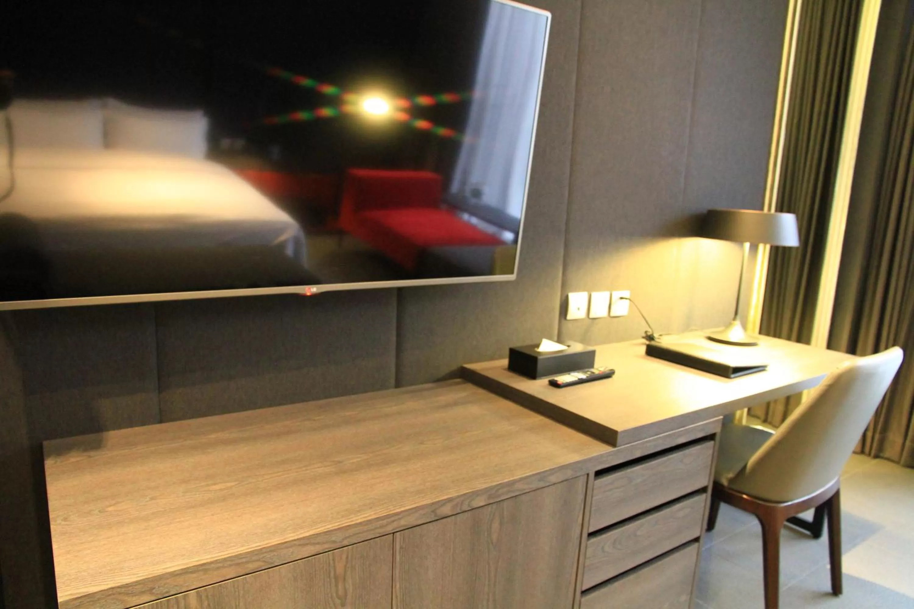 Photo of the whole room, TV/Entertainment Center in Hotel Lainn