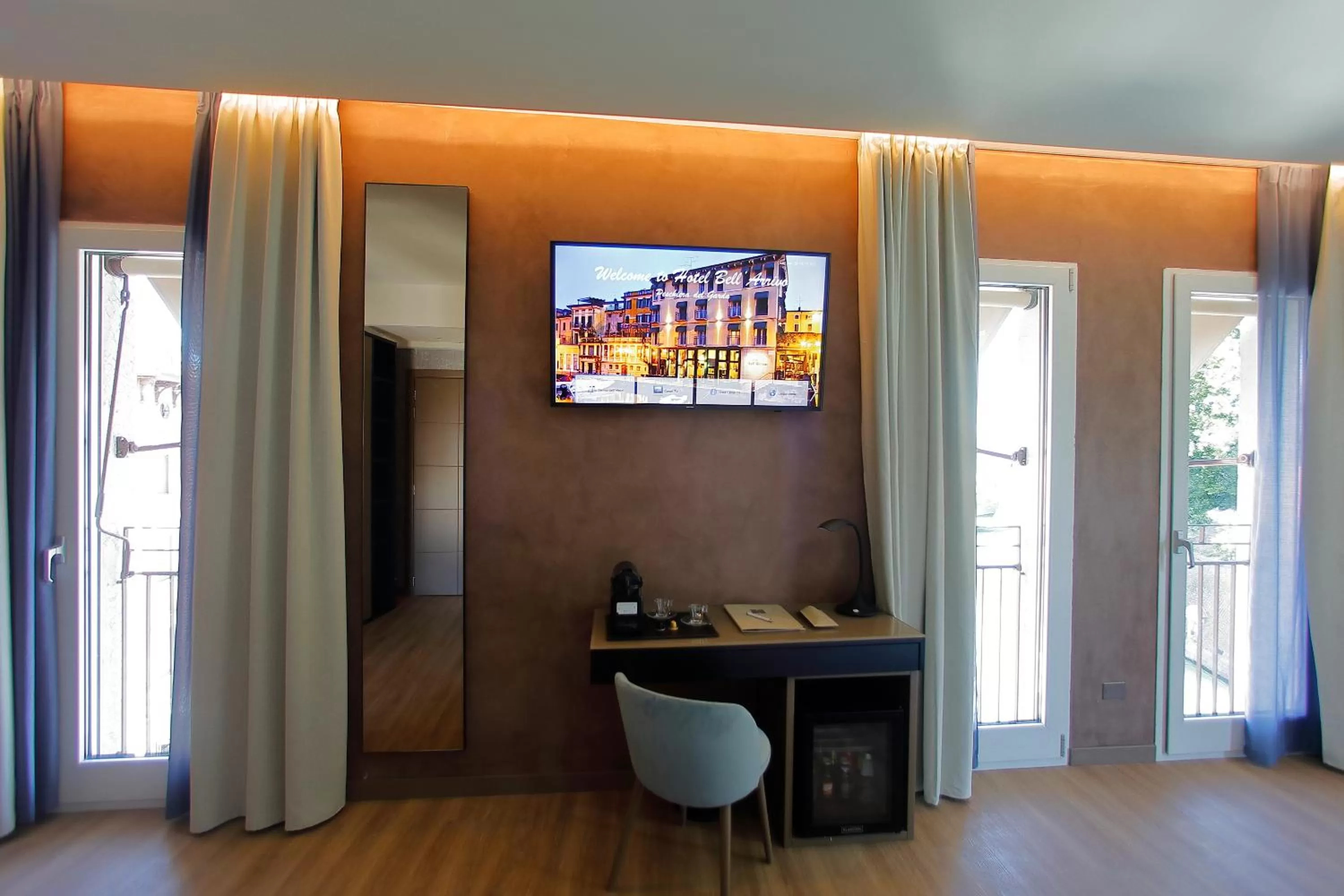TV and multimedia in Hotel Bell'arrivo by Dori