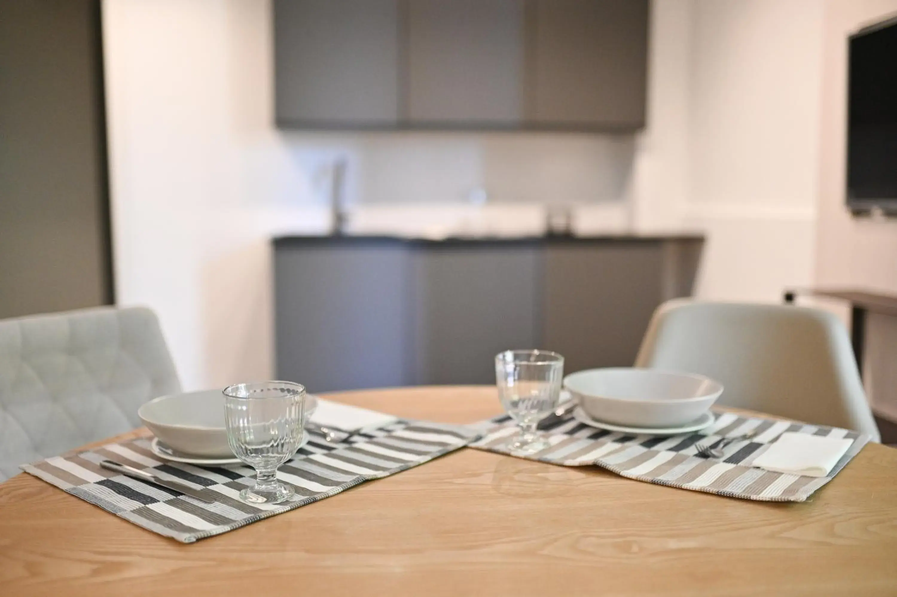 Living room, Kitchen/Kitchenette in Hotel Baia Delle Sirene