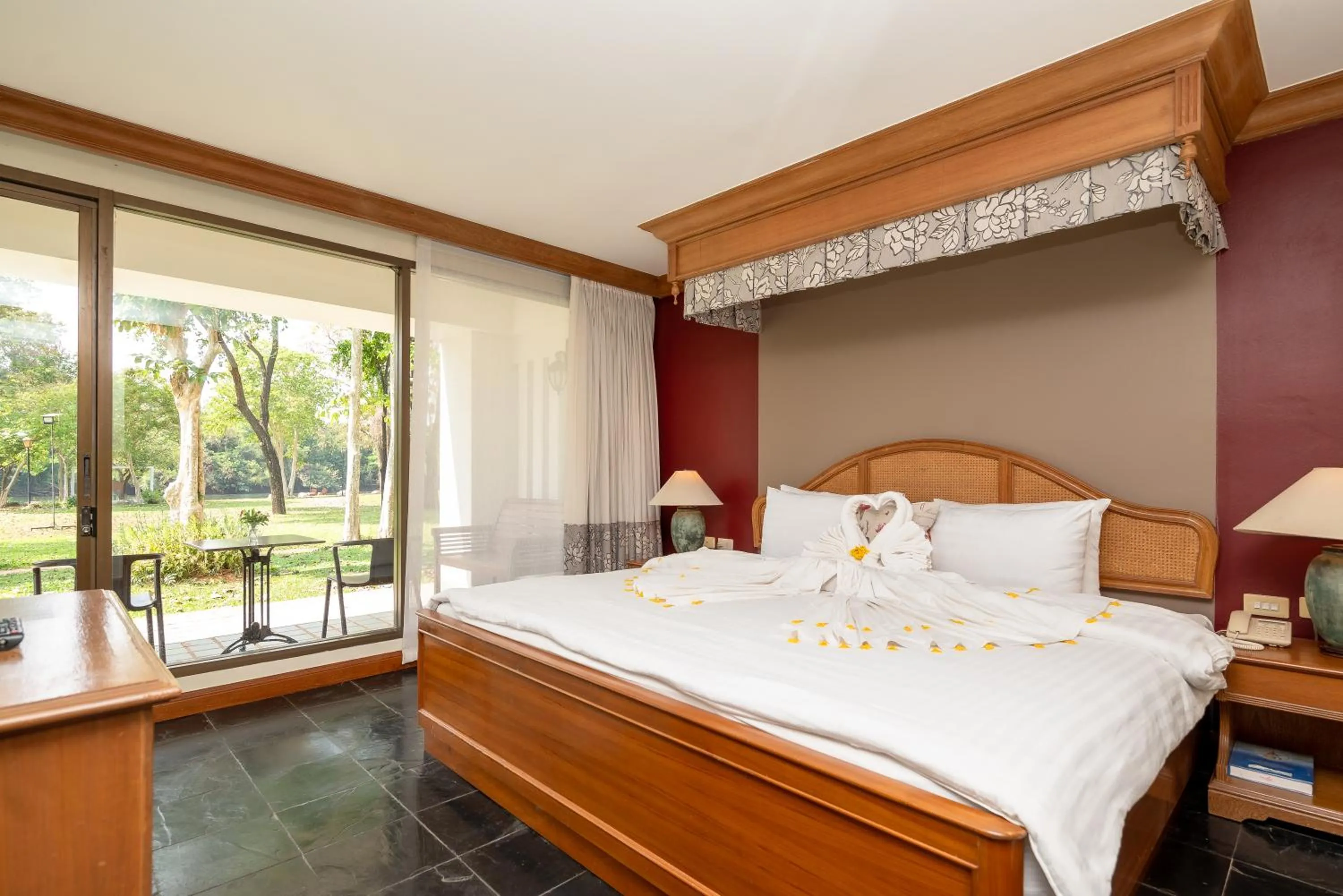 Bed in Comsaed River Kwai Resort