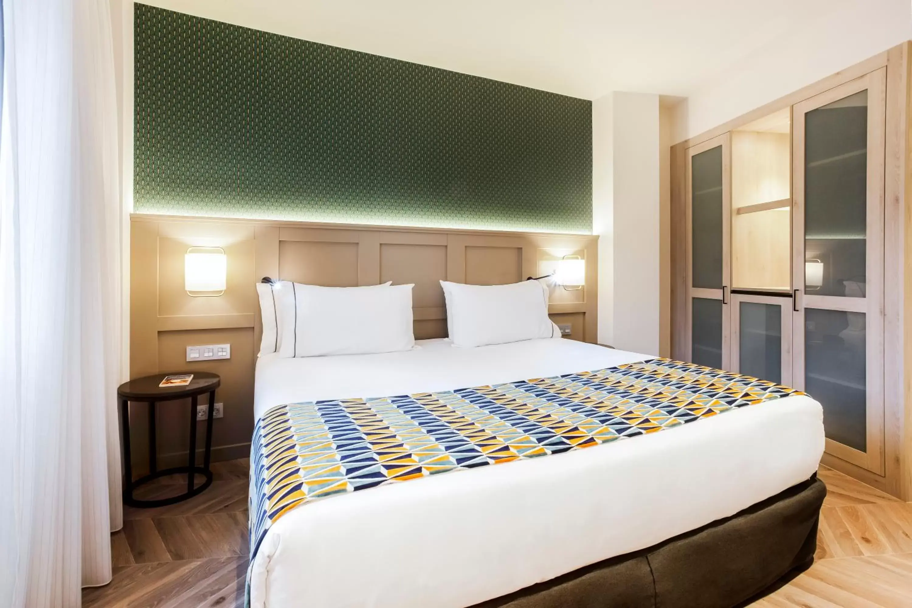 Photo of the whole room, Bed in Eurostars Puerta Real