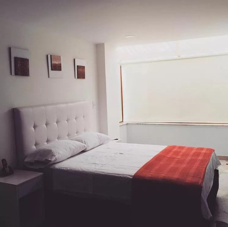 Bed in Hotel Garden City Boutique