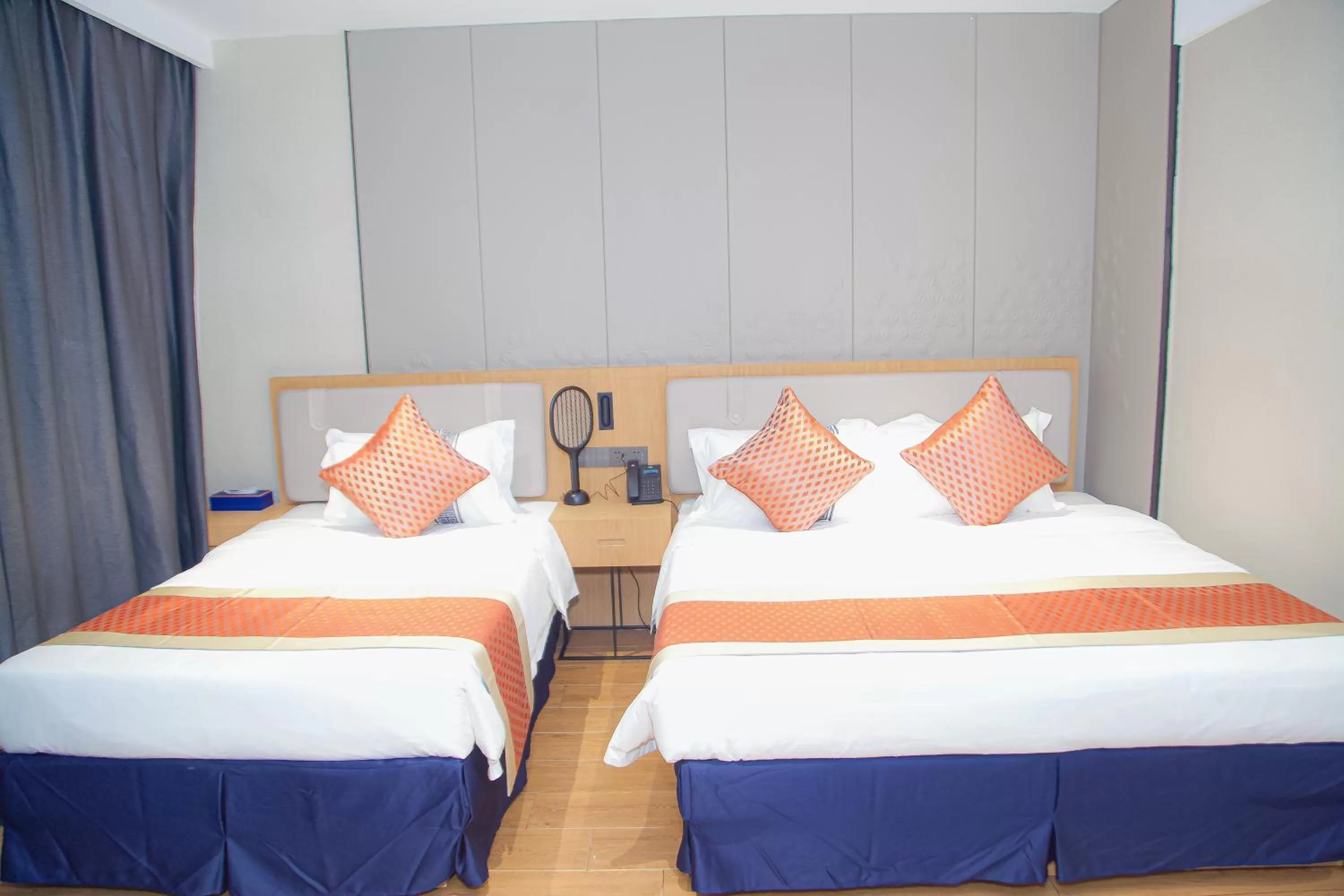 Photo of the whole room in Hôtel FAMILLE MONDIALE