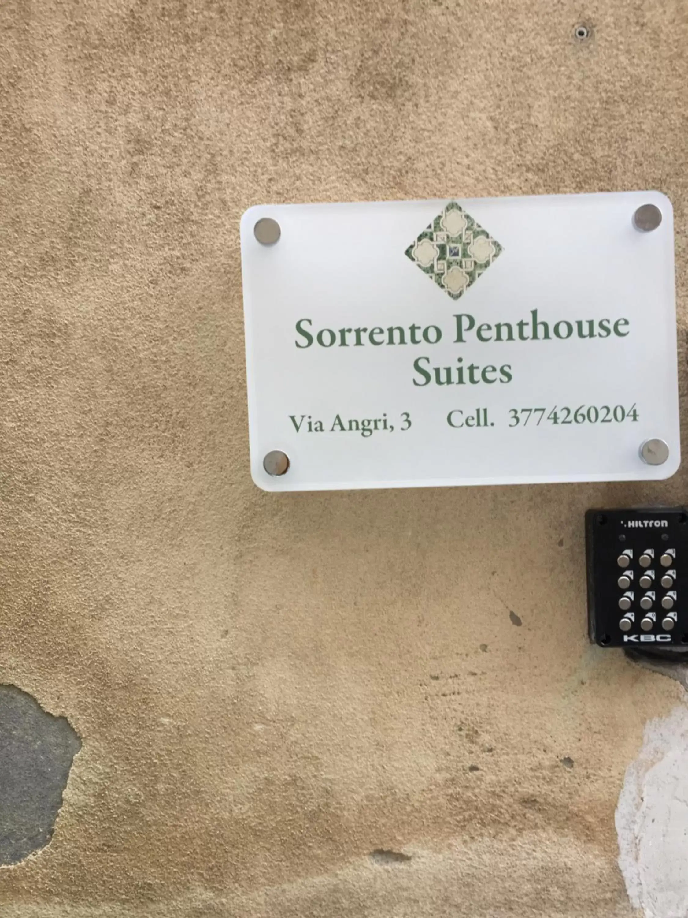 Property logo or sign in Sorrento Penthouse Suites