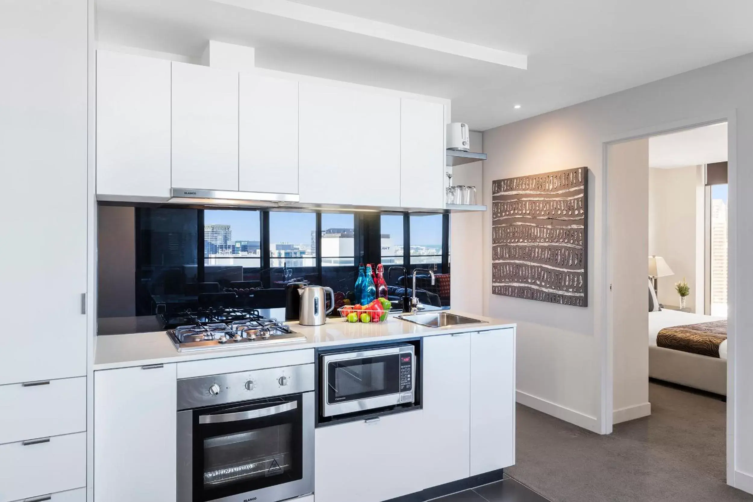 Kitchen or kitchenette, Kitchen/Kitchenette in Aura on Flinders Serviced Apartments