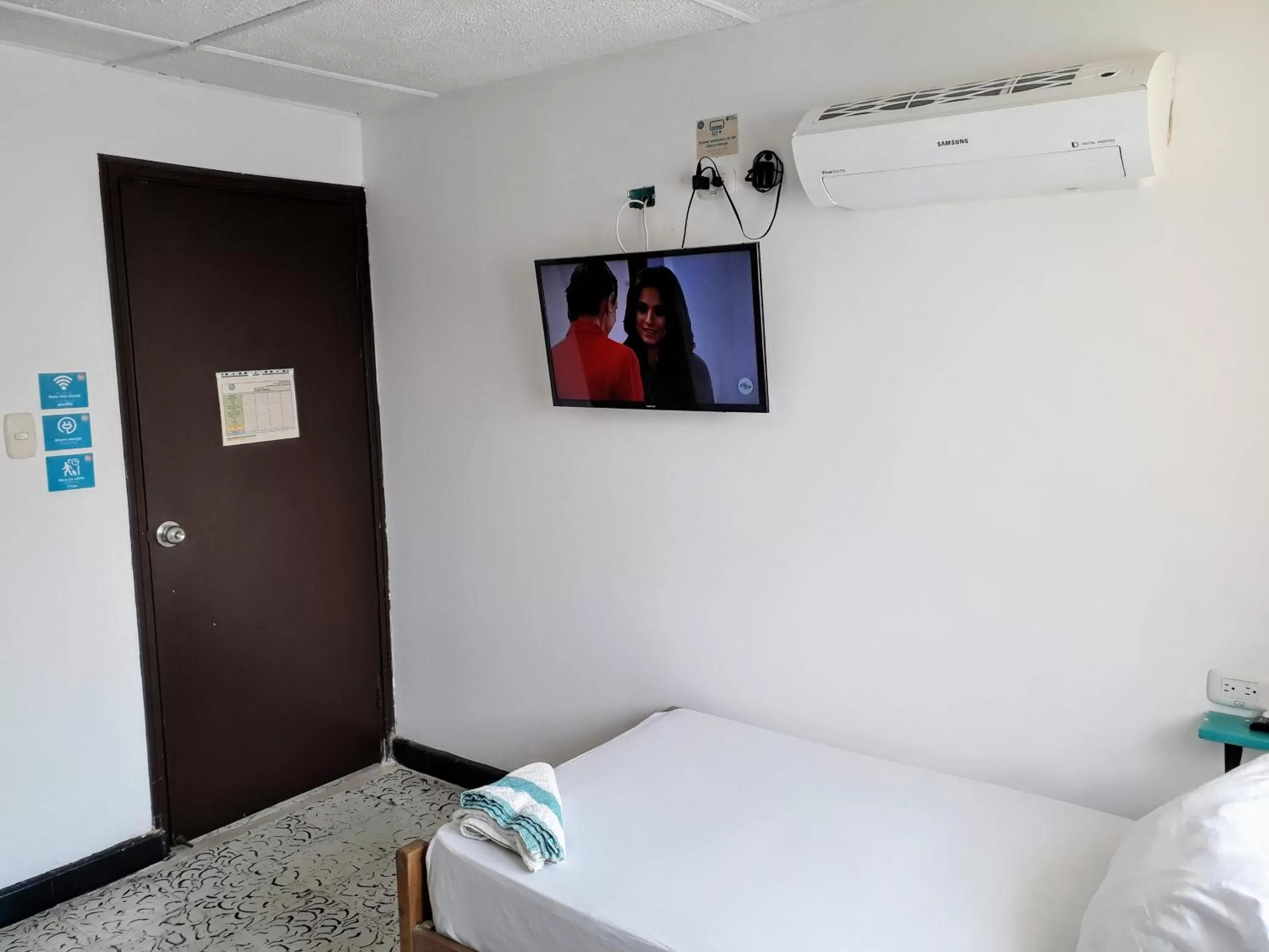 Bed in Bona Vida Hotel