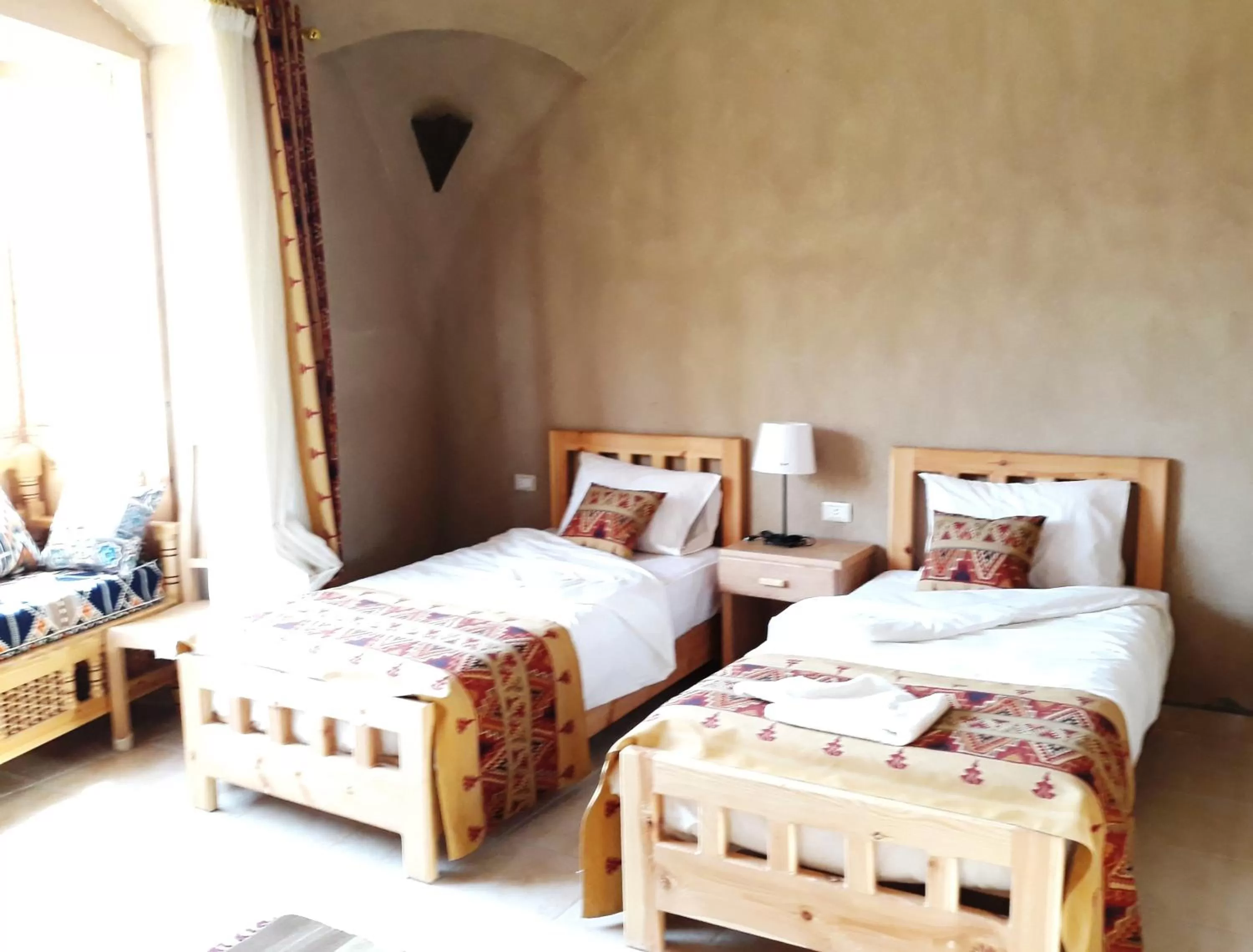 Bed in Embrace Hotel