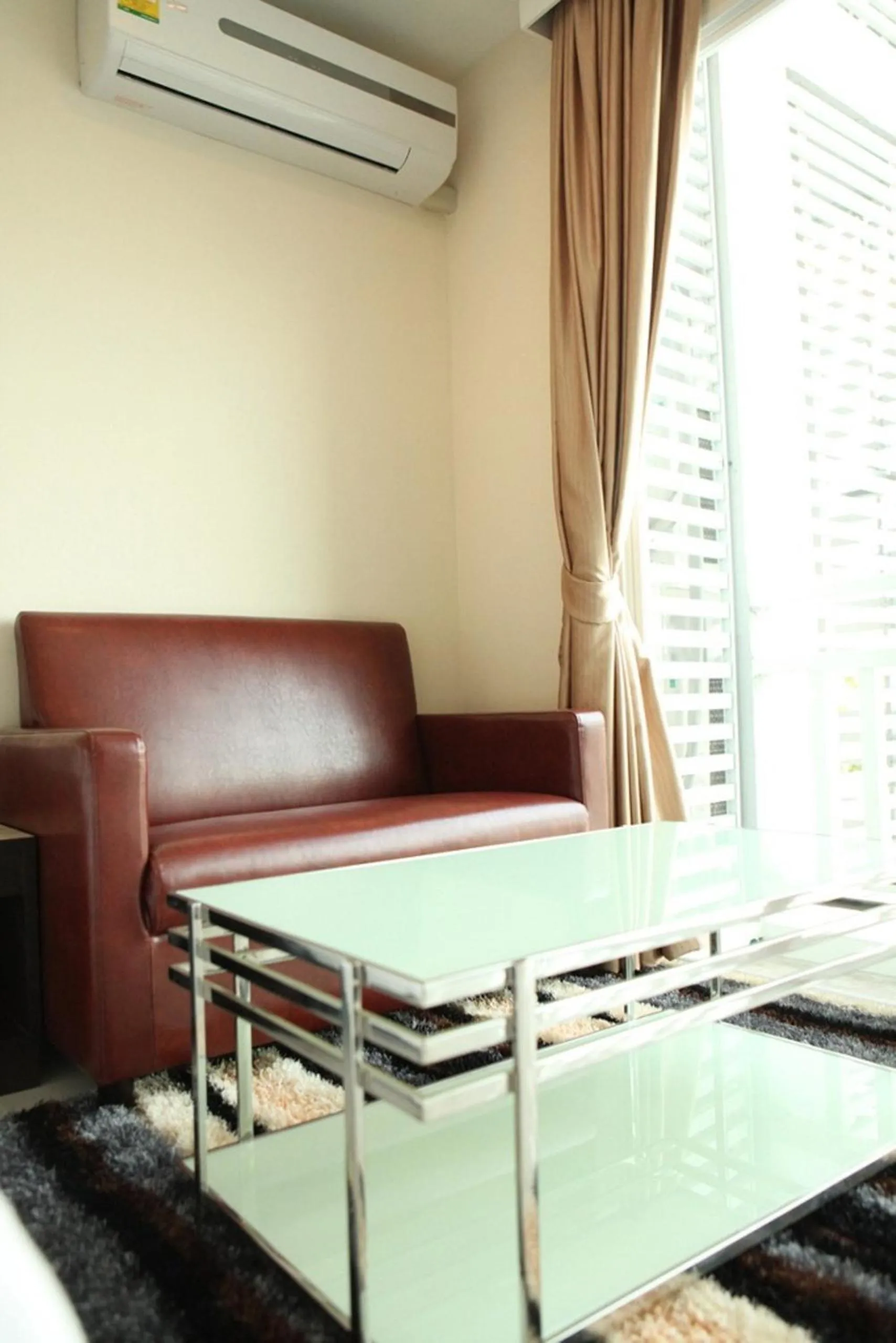 Living room in Golden City Rayong Hotel