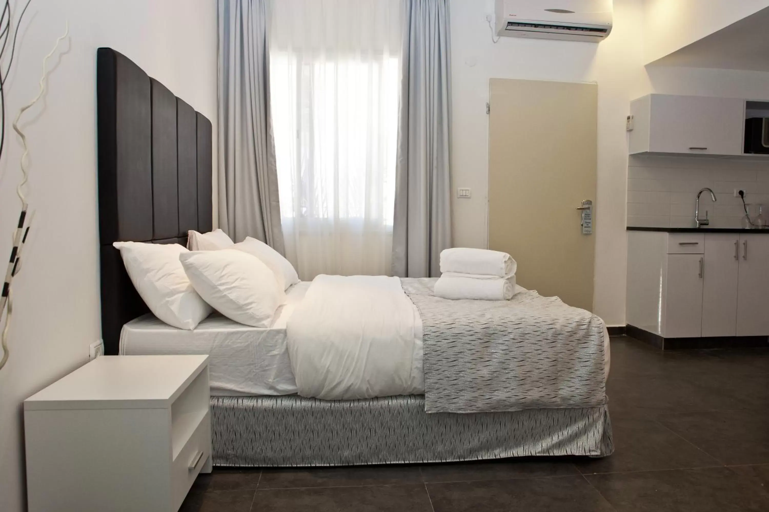 Bed in Geula Suites