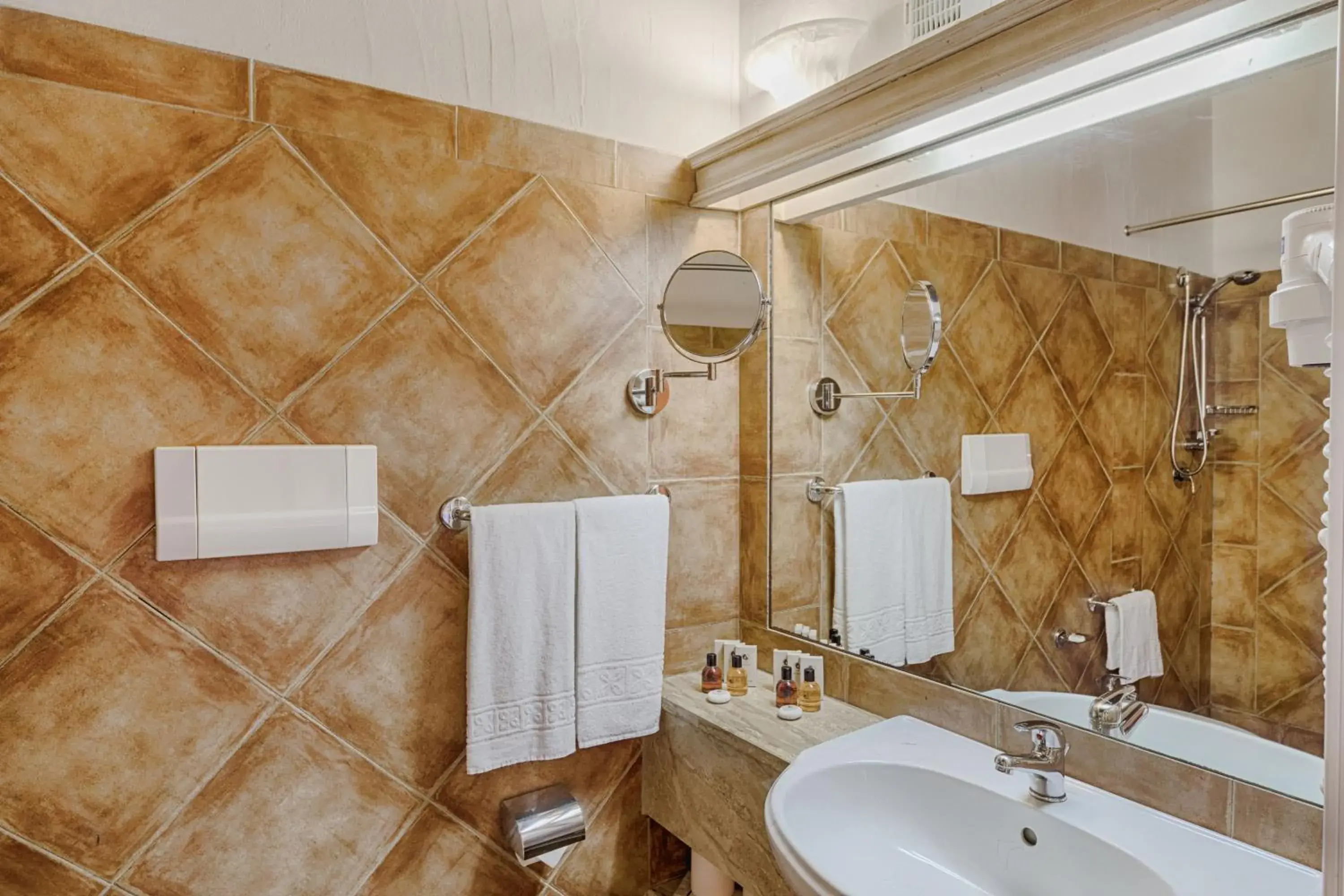 Bathroom in Colonna Hotel Country & Sporting
