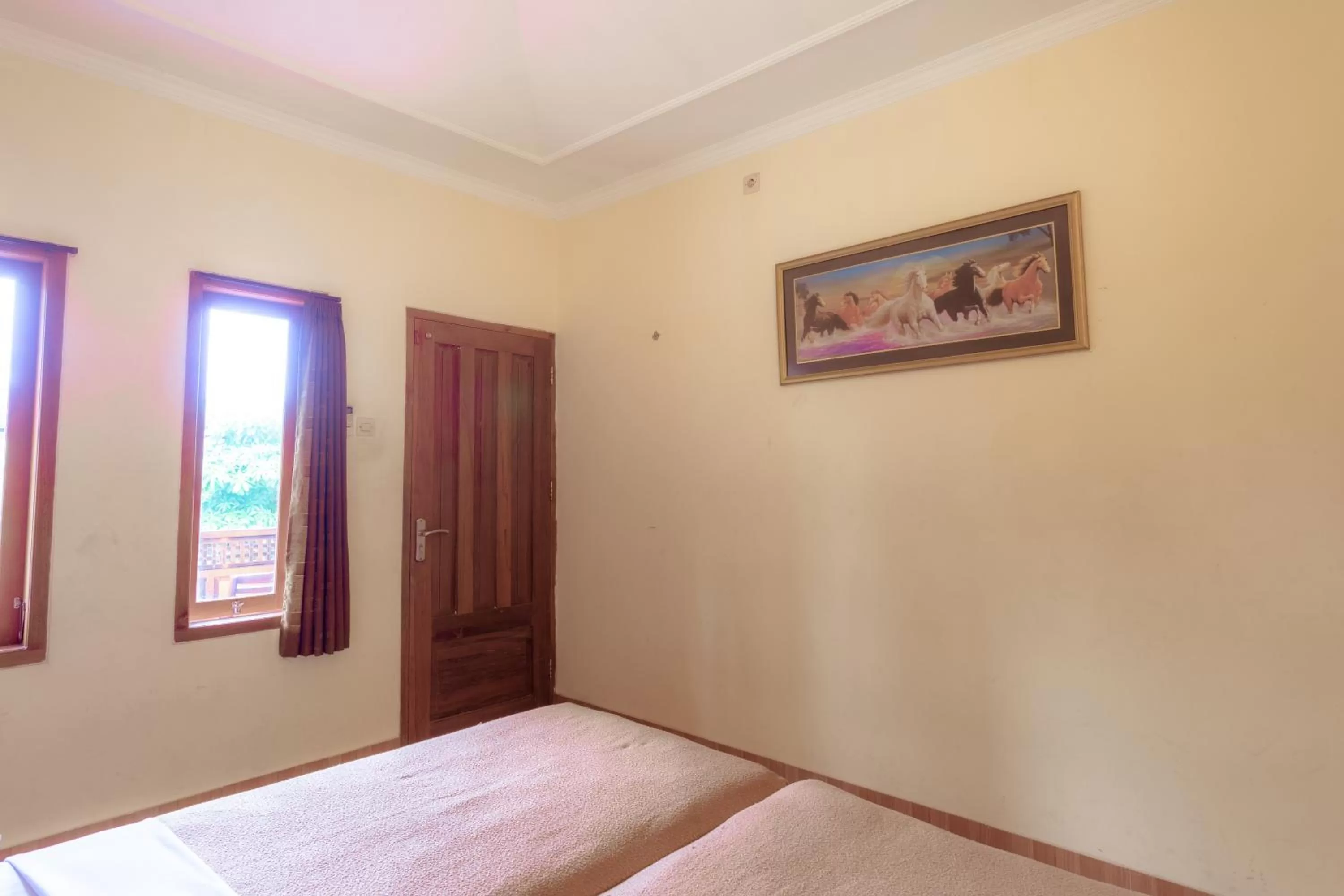 Bedroom, Bed in Hotel Mahkota Plengkung by ecommerceloka