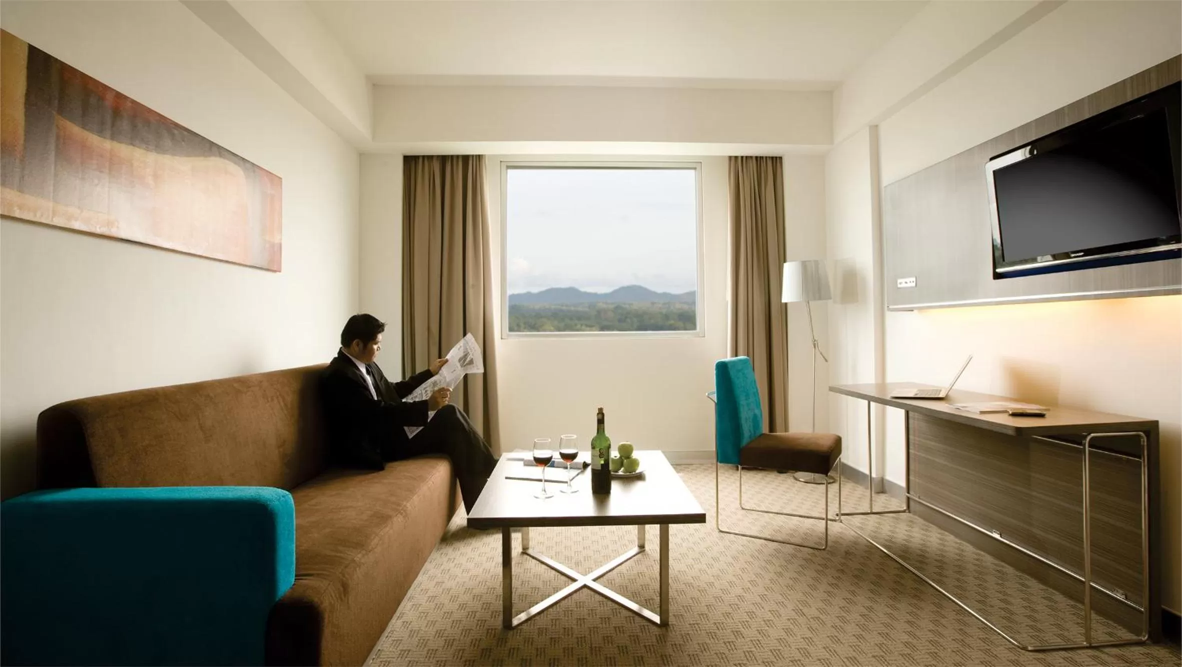 Living room in Novotel Bangka Hotel & Convention Center