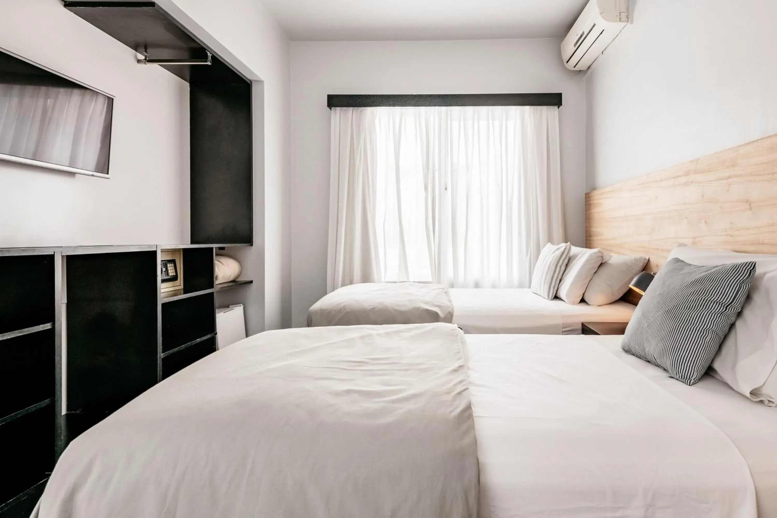 Bed in 5411 Soho Hotel