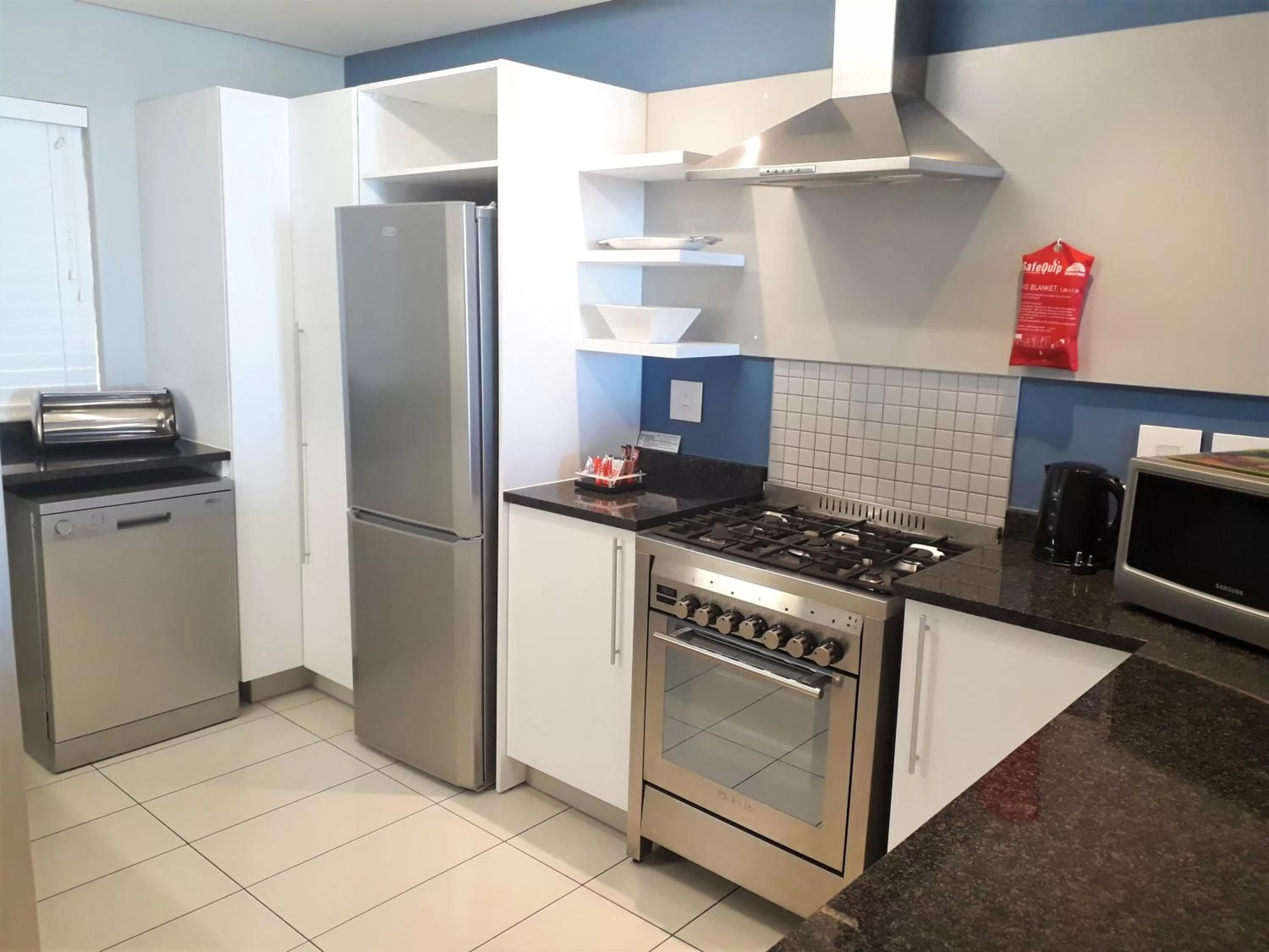 Kitchen or kitchenette in Whale Coast All-Suite-Hotel - DCC Hotel Group