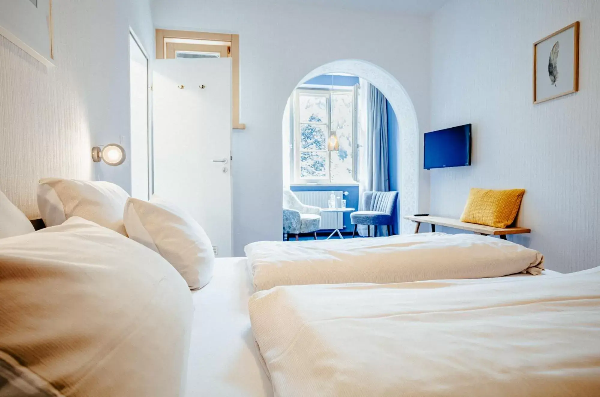 Bed in Alpenrose Bayrischzell Hotel