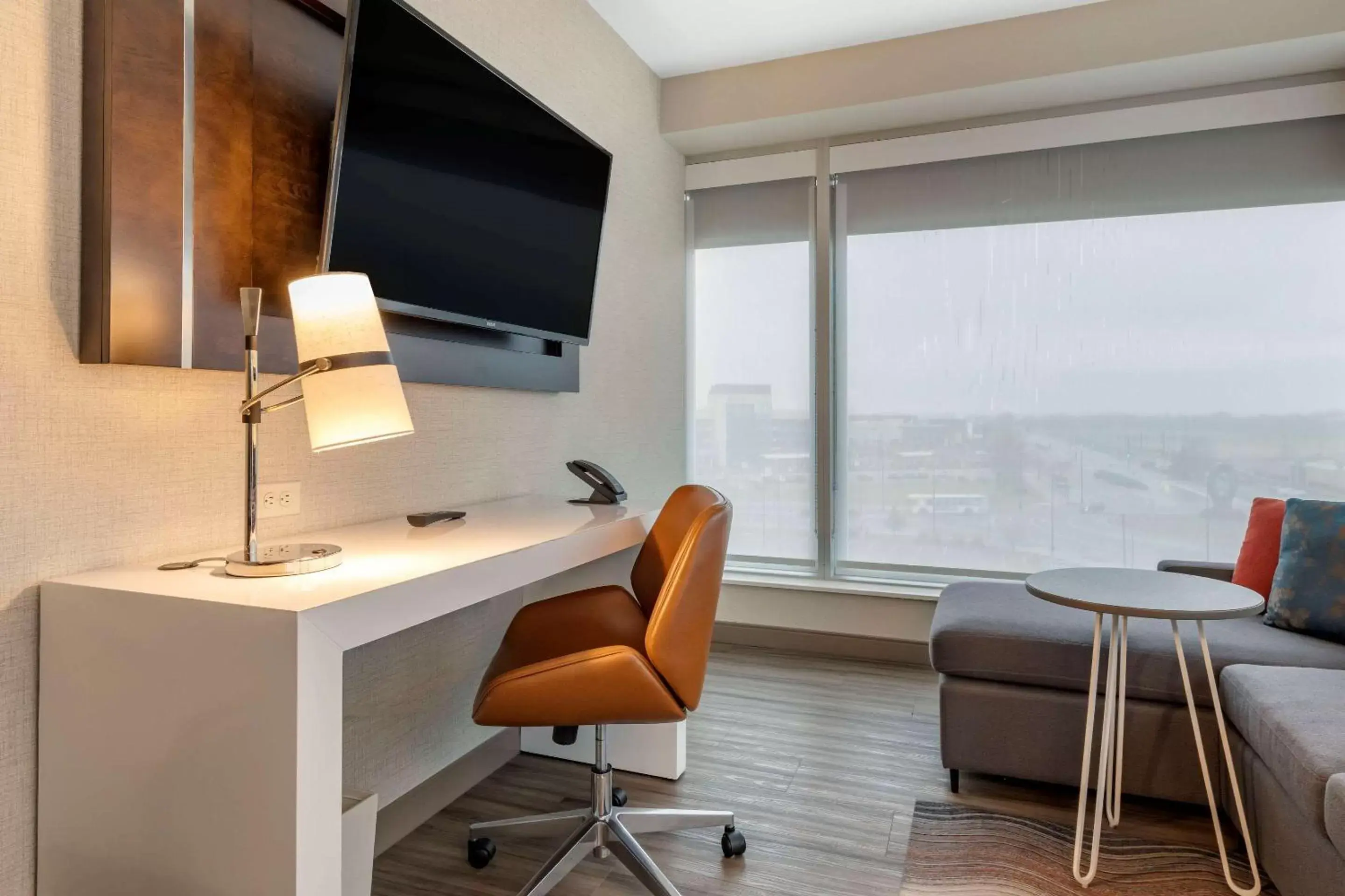 Photo of the whole room, TV/Entertainment Center in Cambria Hotel Bloomington Mall of America Minneapolis Airport