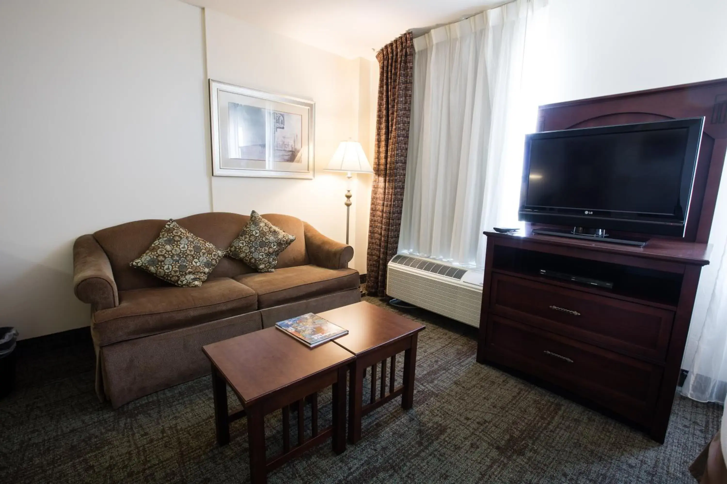 Photo of the whole room, TV/Entertainment Center in Staybridge Suites Austin Airport, an IHG Hotel