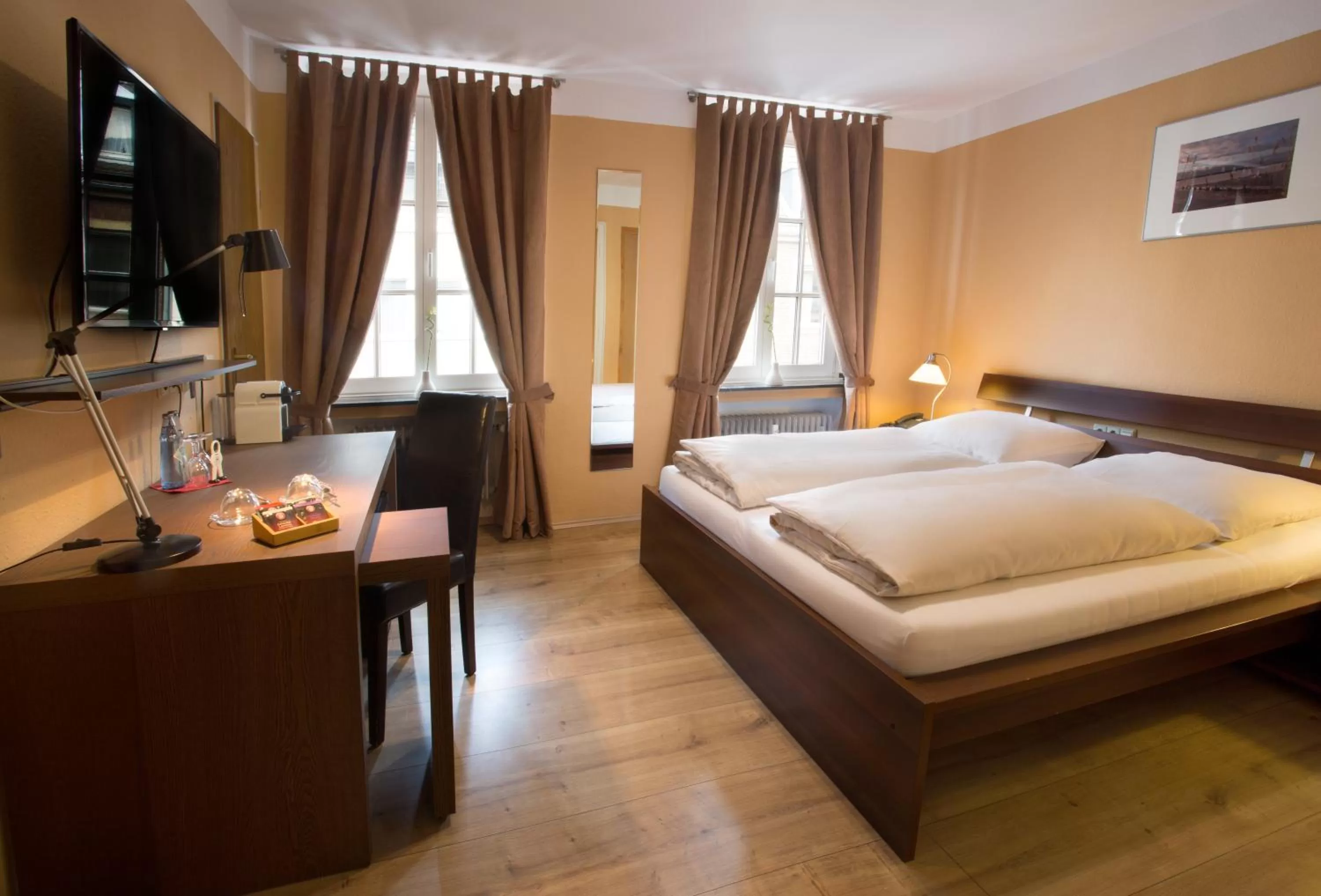 Photo of the whole room, Bed in Stadthotel Jülich