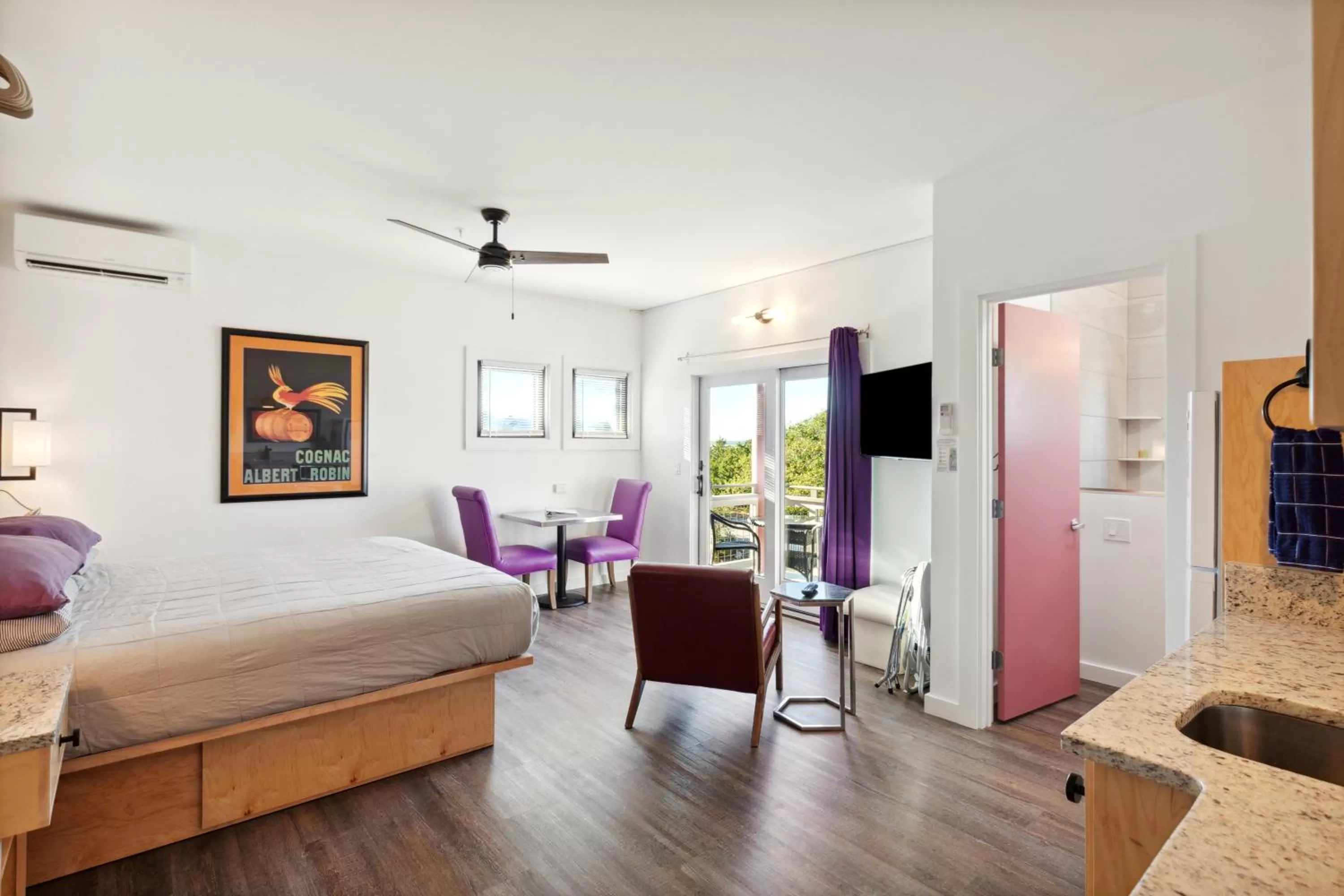 Bed in Hotel Folly with Marsh and Sunset Views