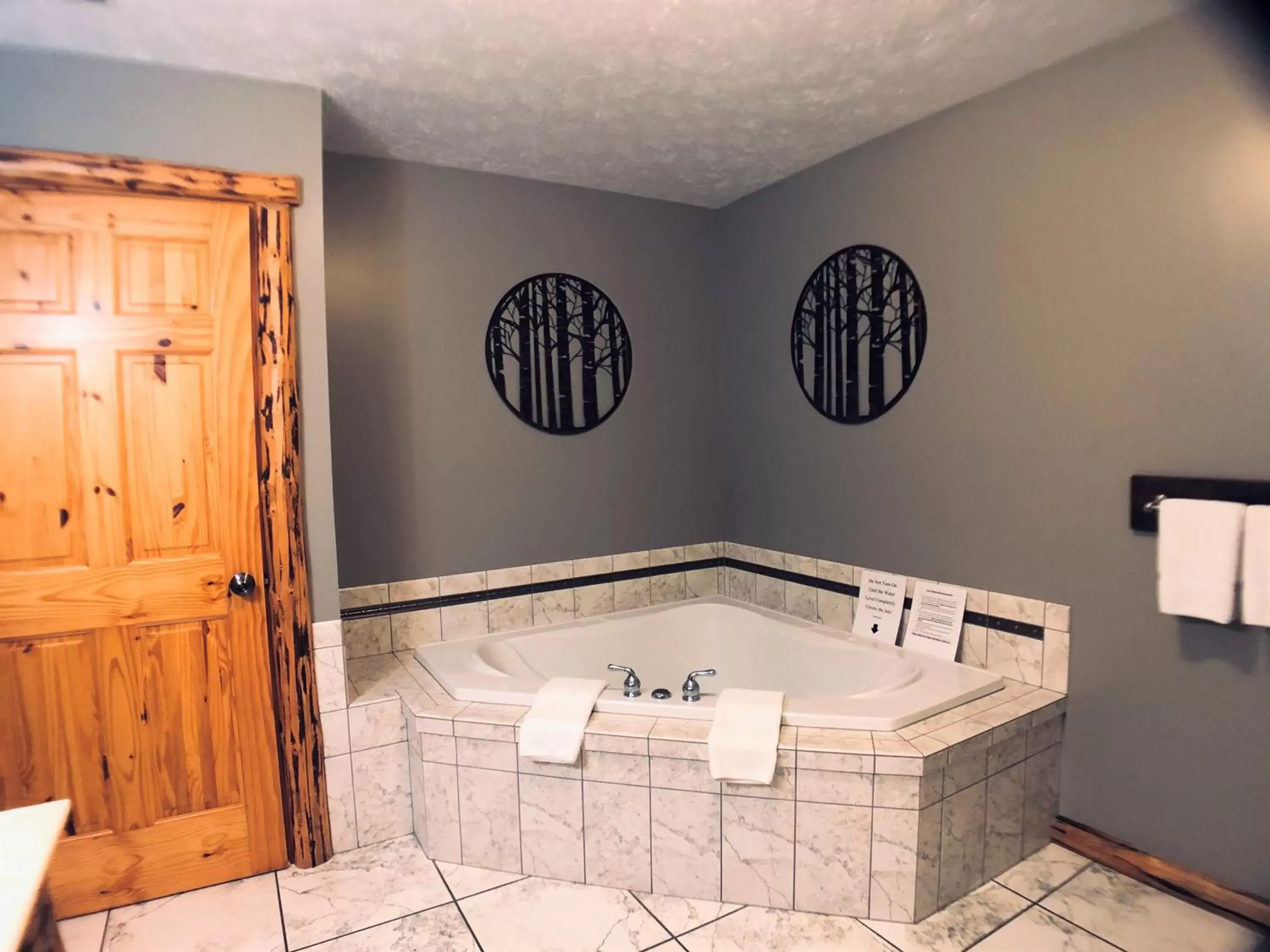 Bathroom in Sojourner's Lodge & Log Cabin Suites