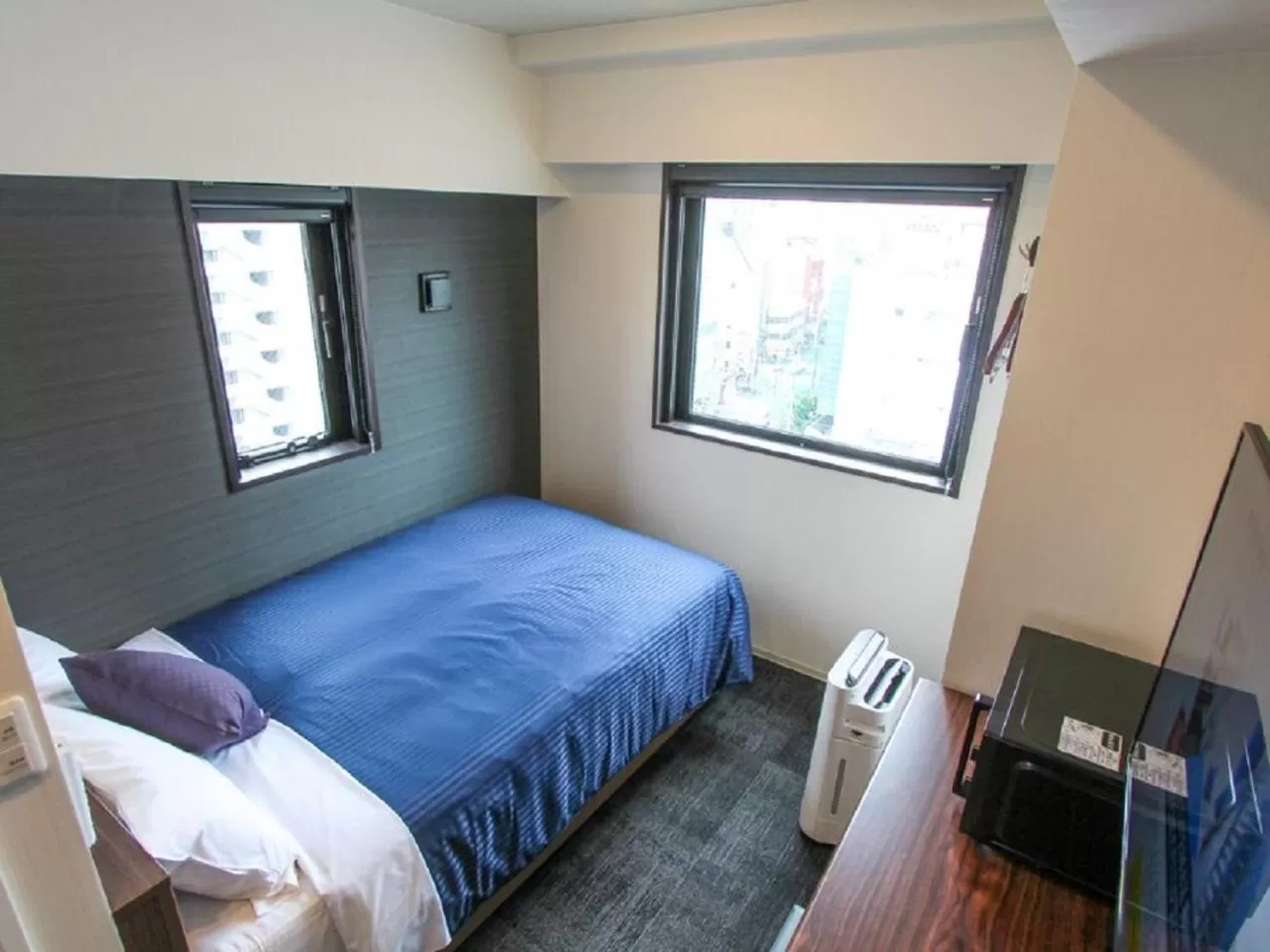 Bed in HOTEL LiVEMAX Umeda WEST