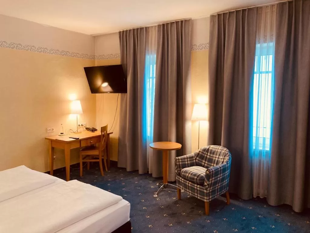 Bed in Hotel Rosenheimer Hof