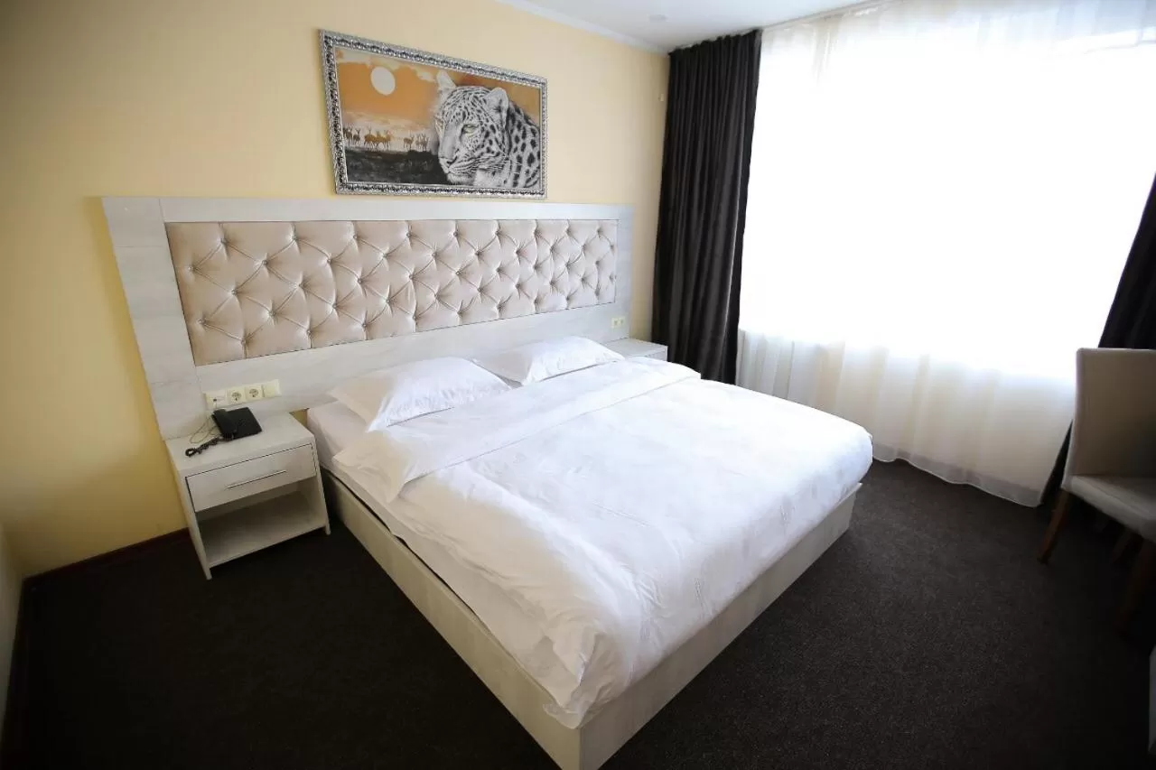 Bed in Altai Business Hotel