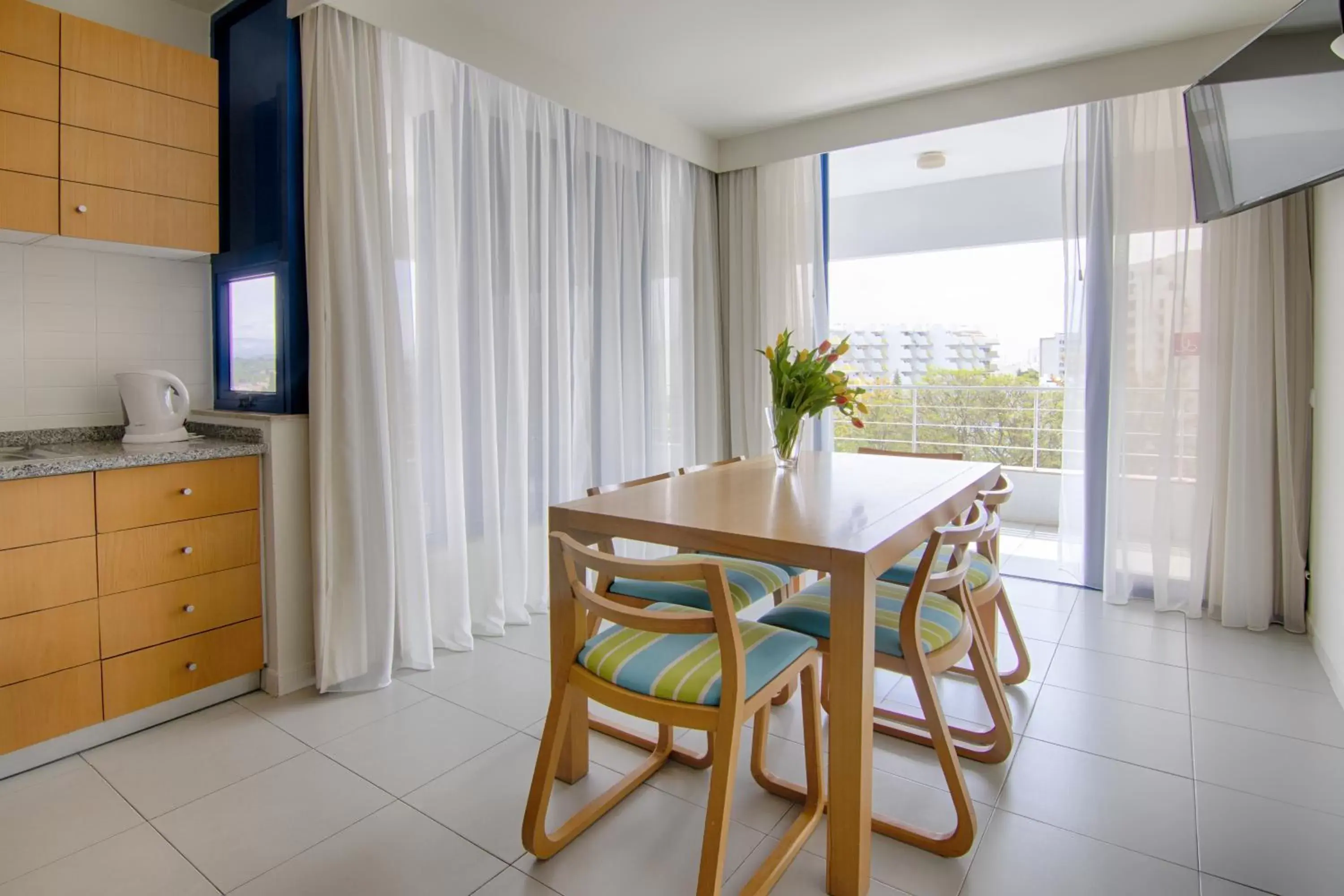 Kitchen or kitchenette, Dining Area in Luna Olympus