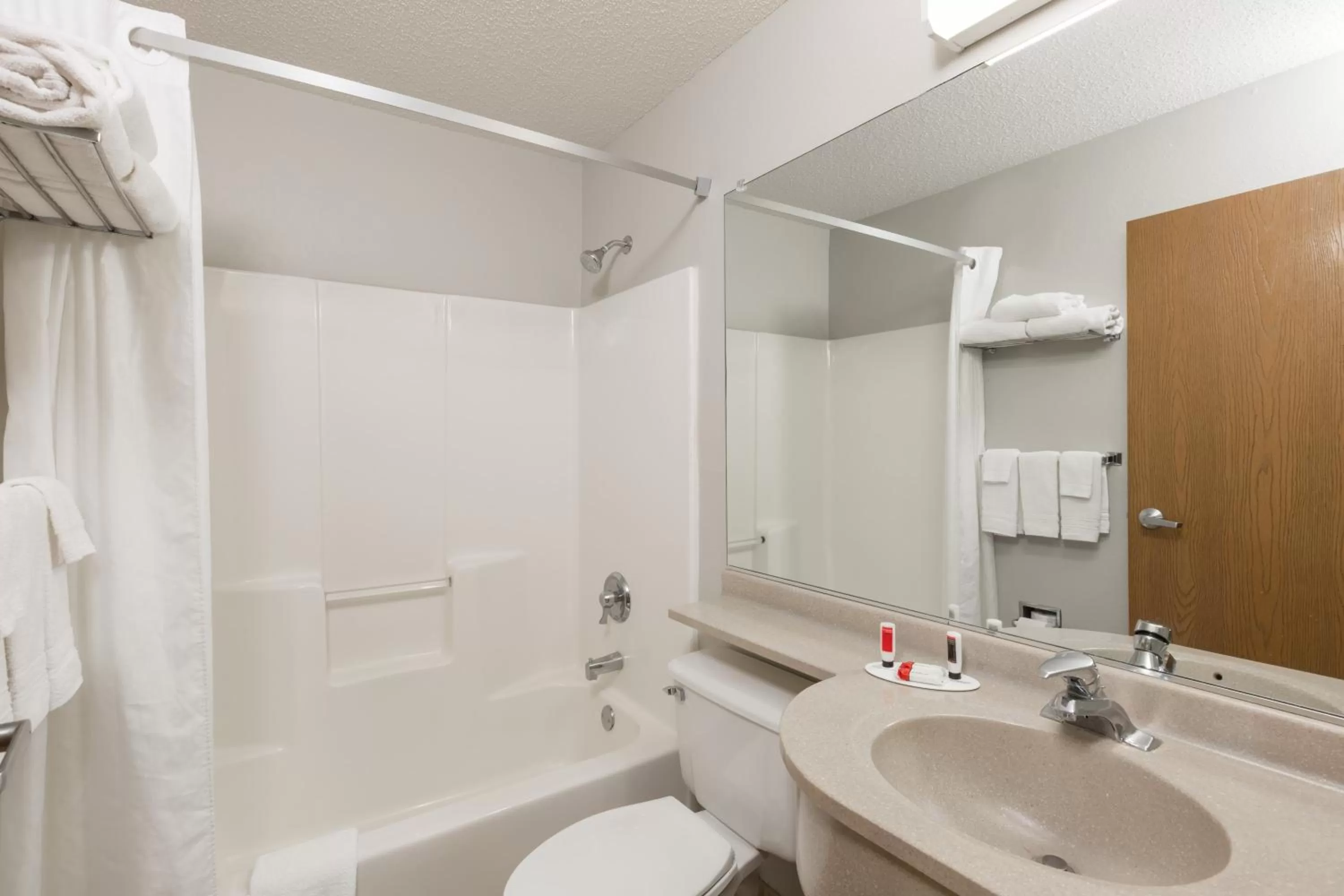 Toilet in Microtel Inn & Suites by Wyndham Sioux Falls