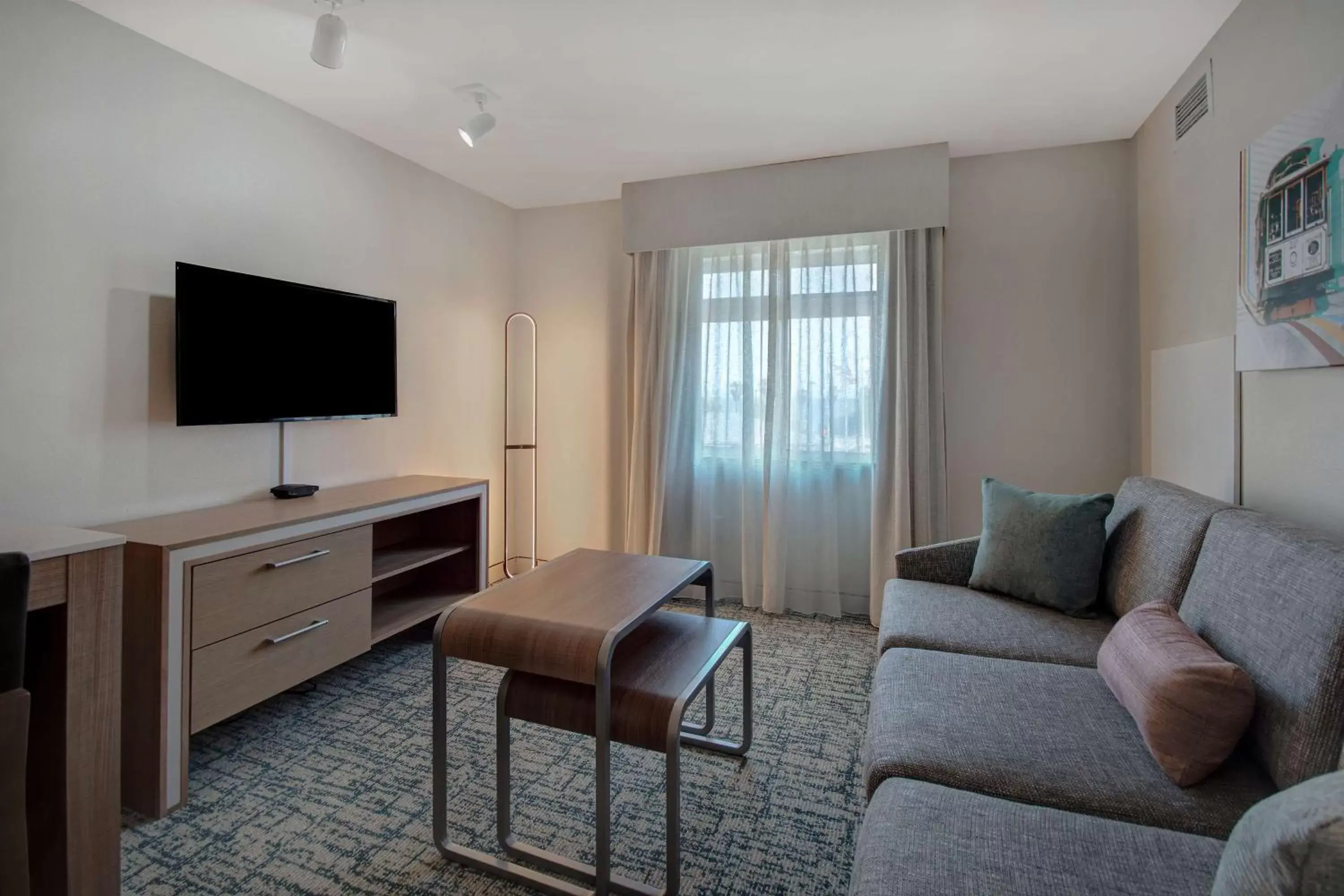 Living room, TV/Entertainment Center in Homewood Suites by Hilton San Francisco Airport North California