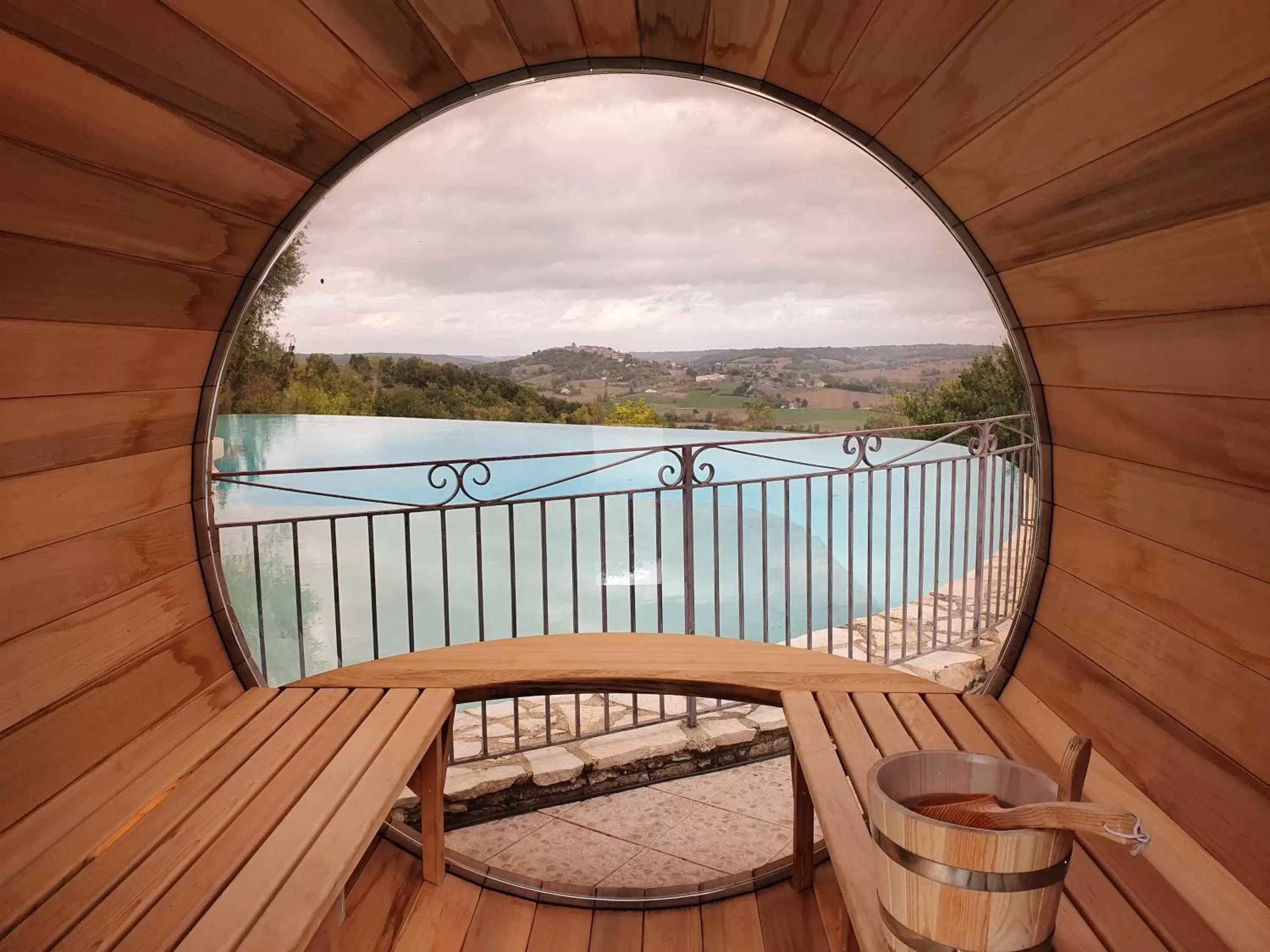 Sauna, Pool View in Le Belvédère Hotel et Bien être