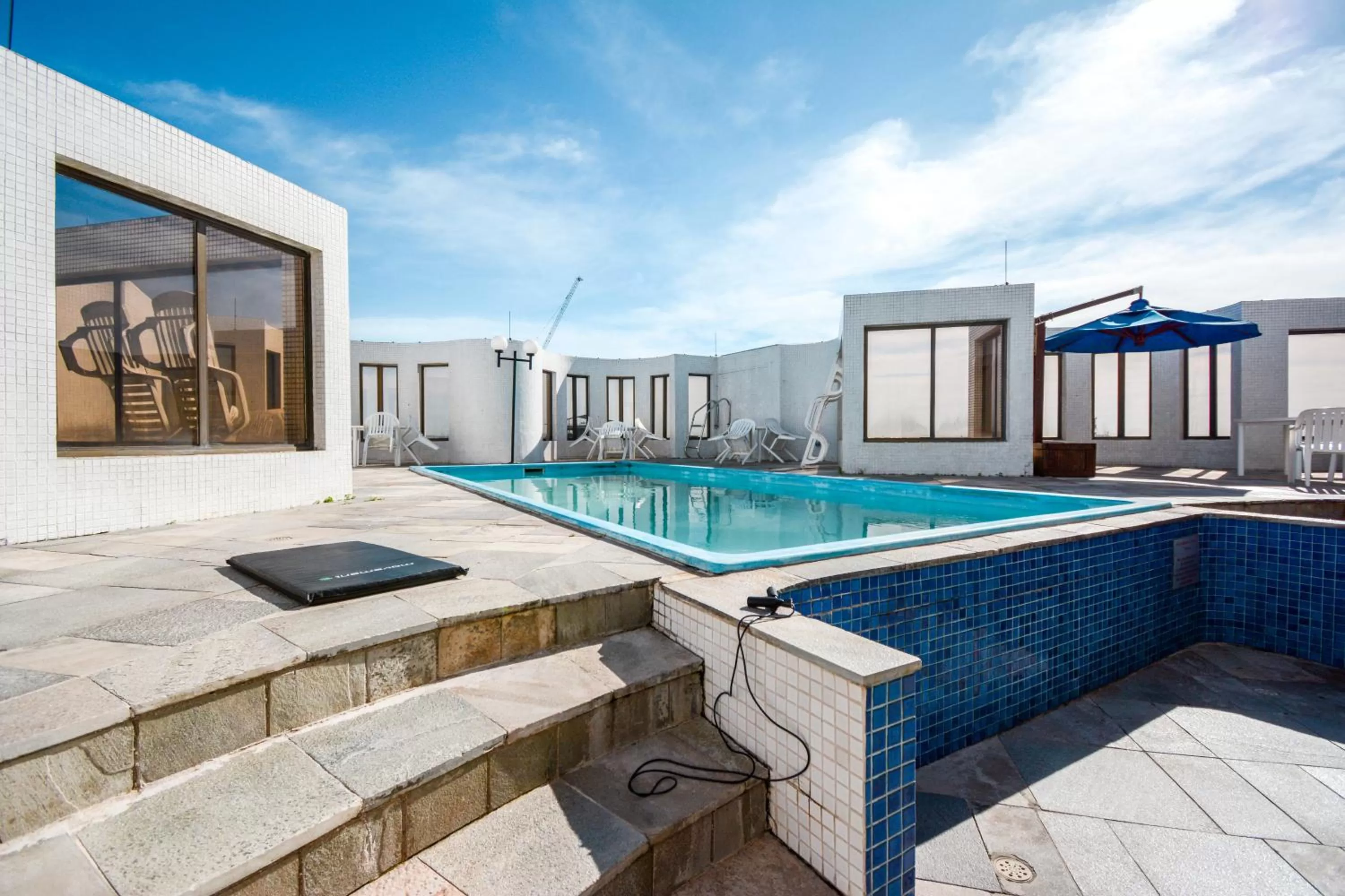 Swimming Pool in Wall Street Apartments by BnbHost