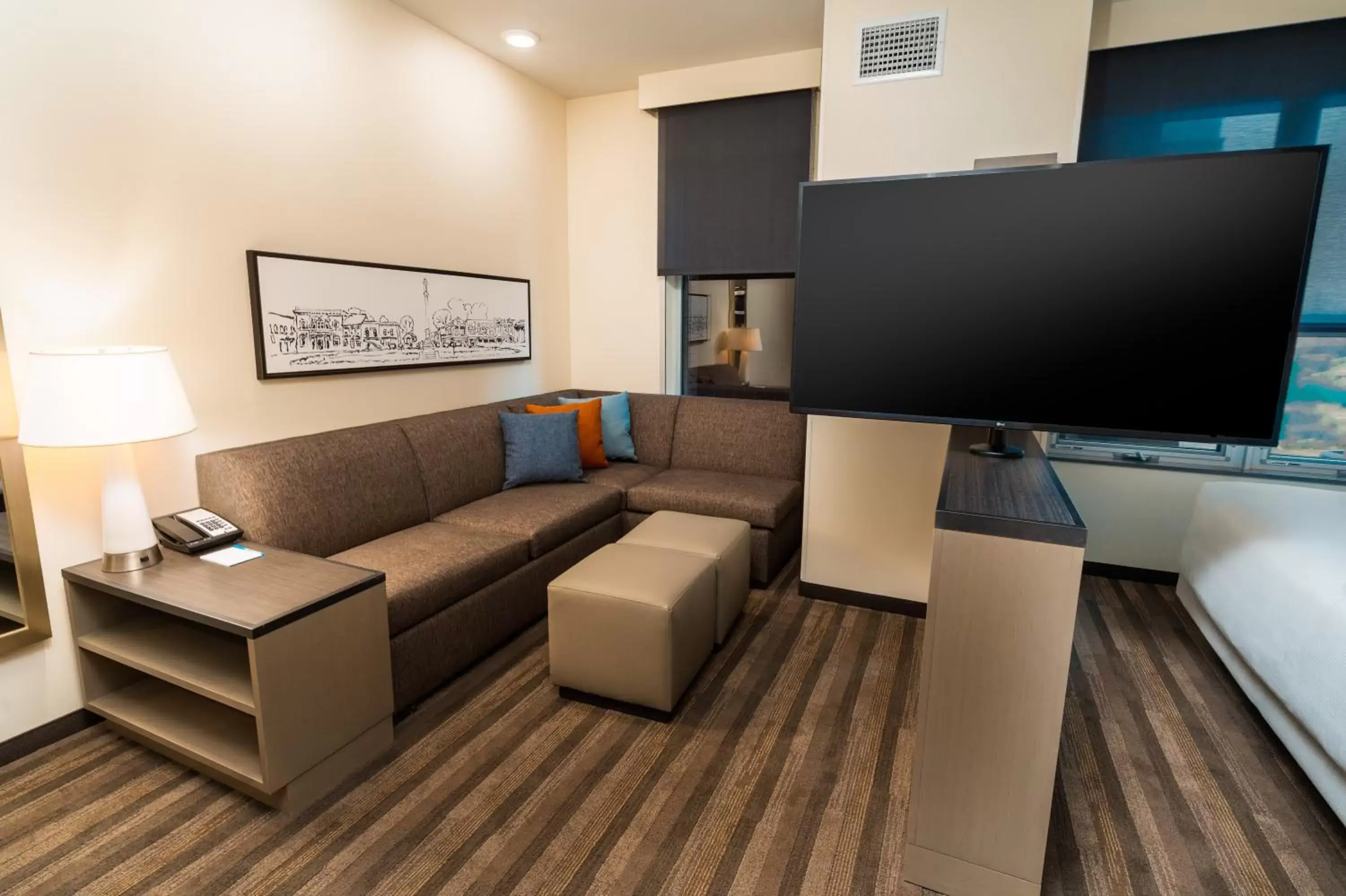 Living room, TV/Entertainment Center in Hyatt House Nashville/Franklin/Cool Springs