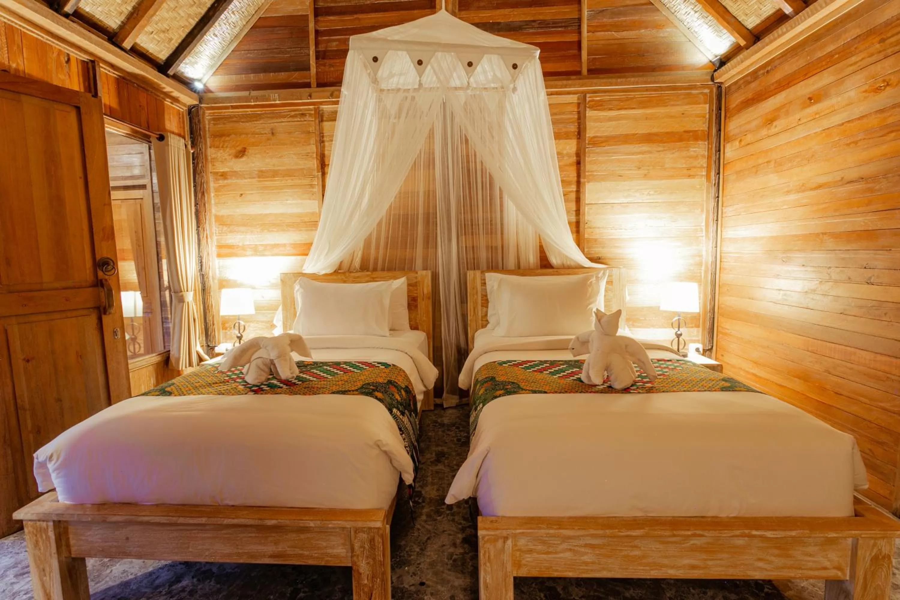 Bed in Nauna Villa Ubud