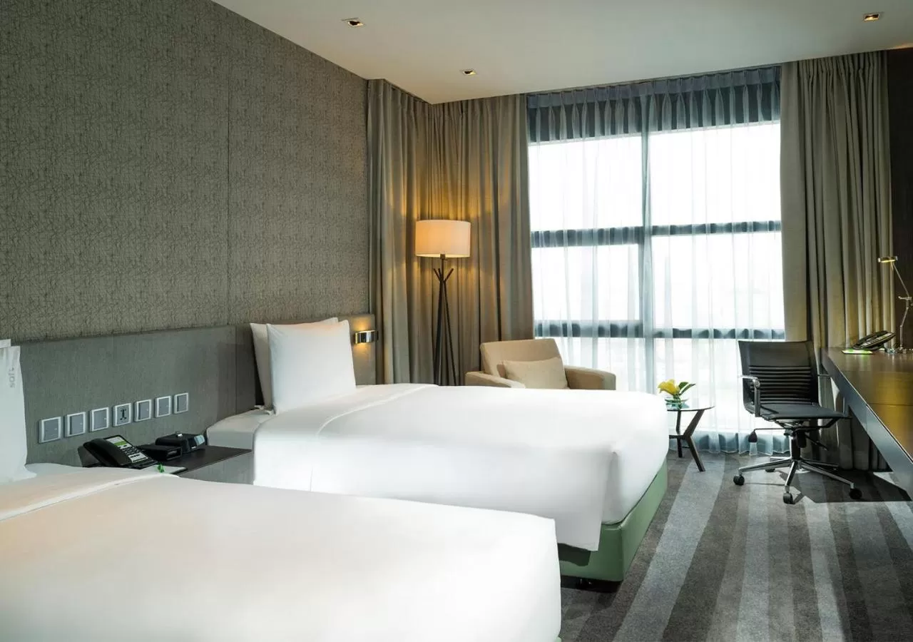 Bed in Holiday Inn Bangkok Sukhumvit by IHG