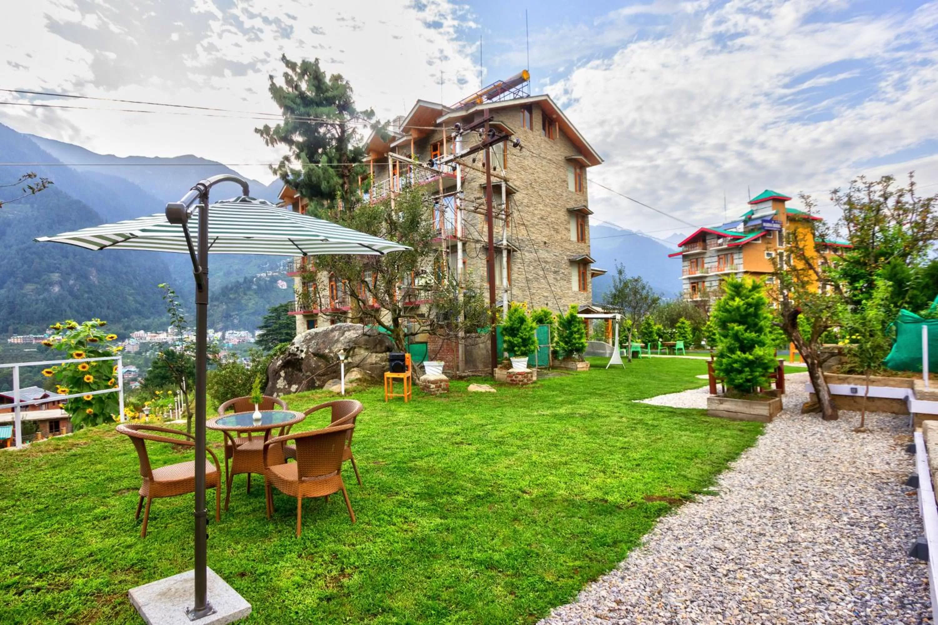 Garden in Snow City's Montana Blues Resort Manali - Heated & Air-Cooled Stay