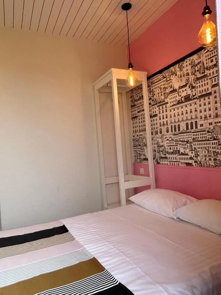 Bed in Hôtel de la Croix-Rousse