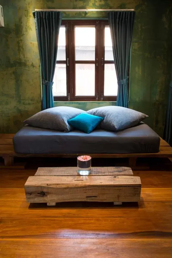 Living room, Bed in Maisons Wat Kor