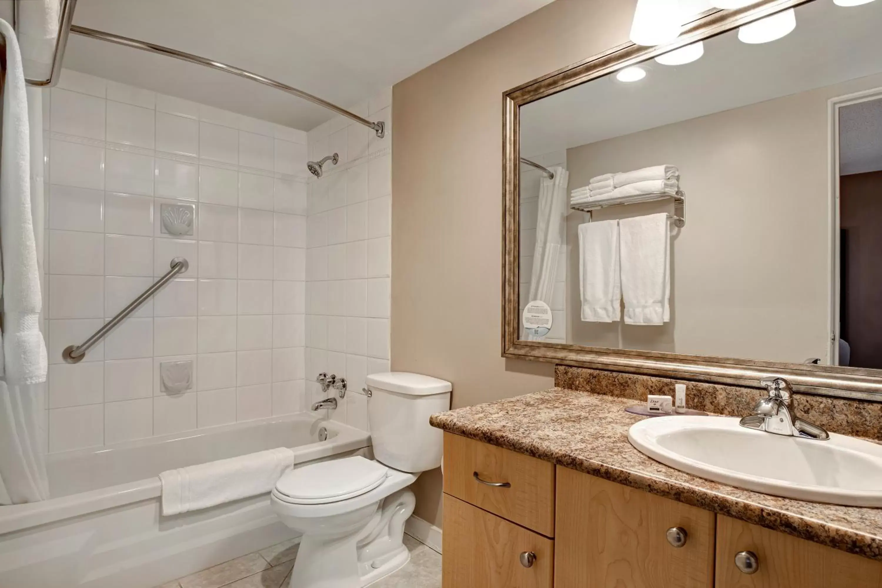 Bathroom in Days Inn by Wyndham Victoria Uptown