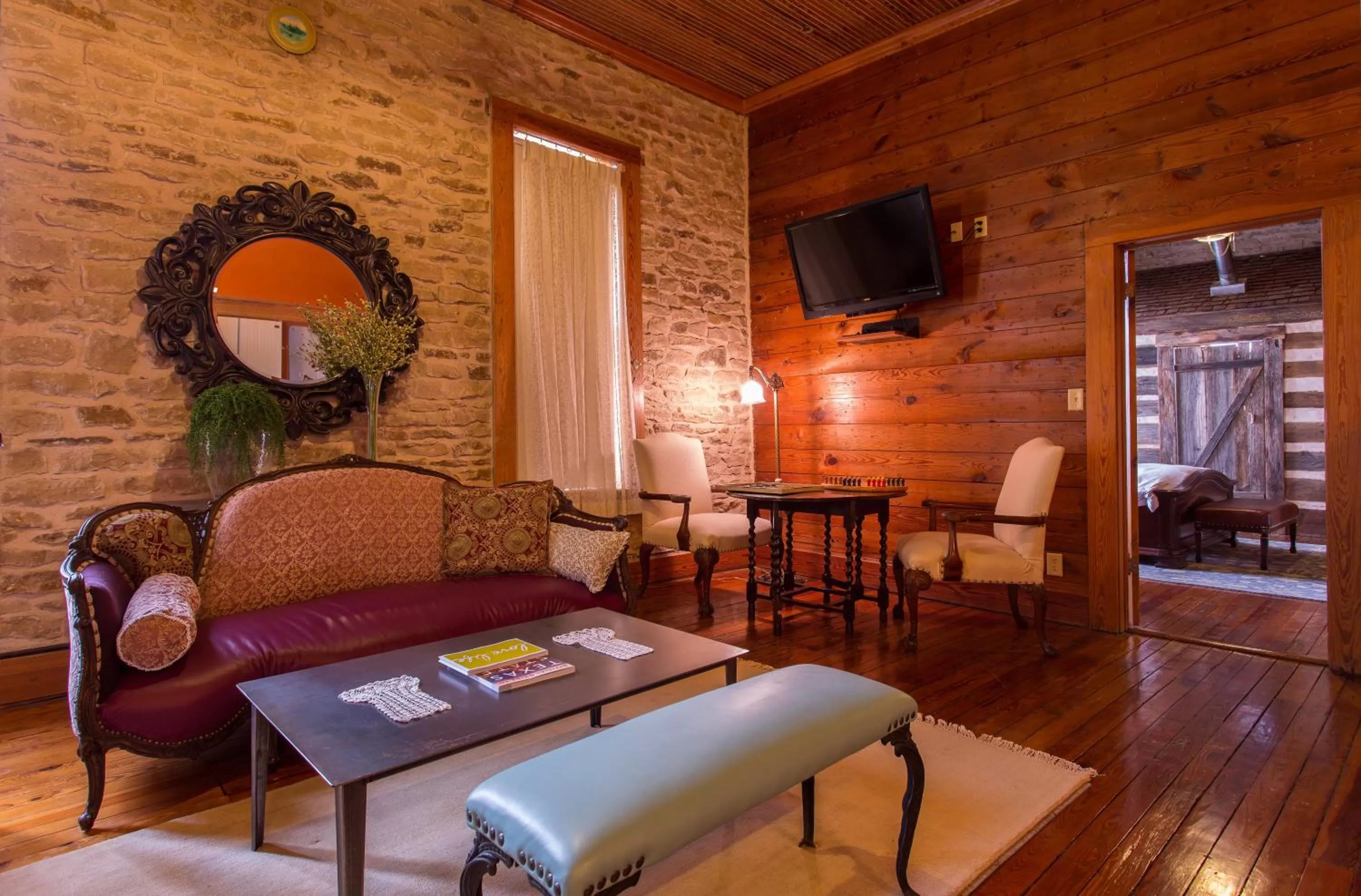 Communal lounge/ TV room in Upstairs Inn