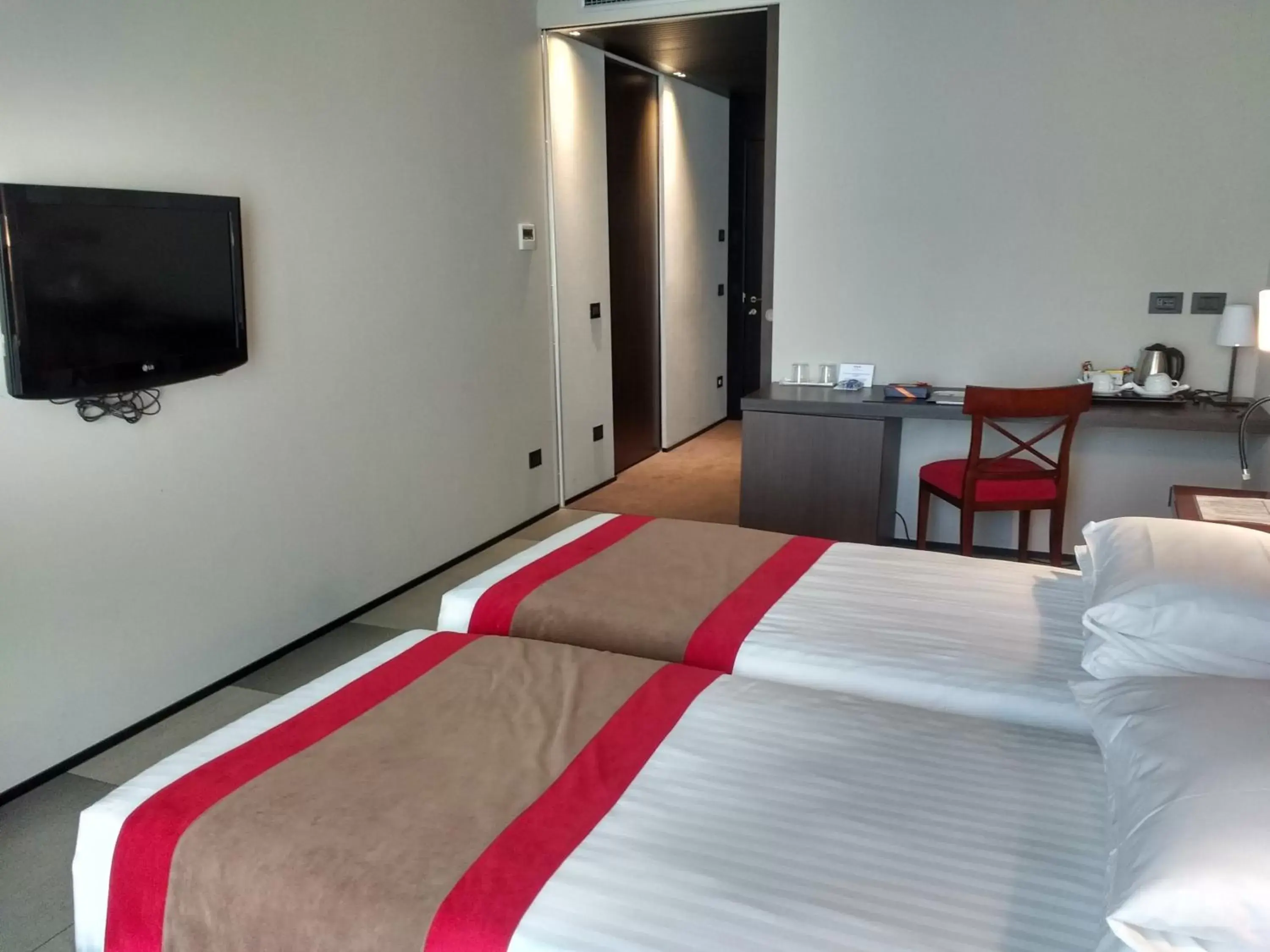Bed in iH Hotels Milano Ambasciatori