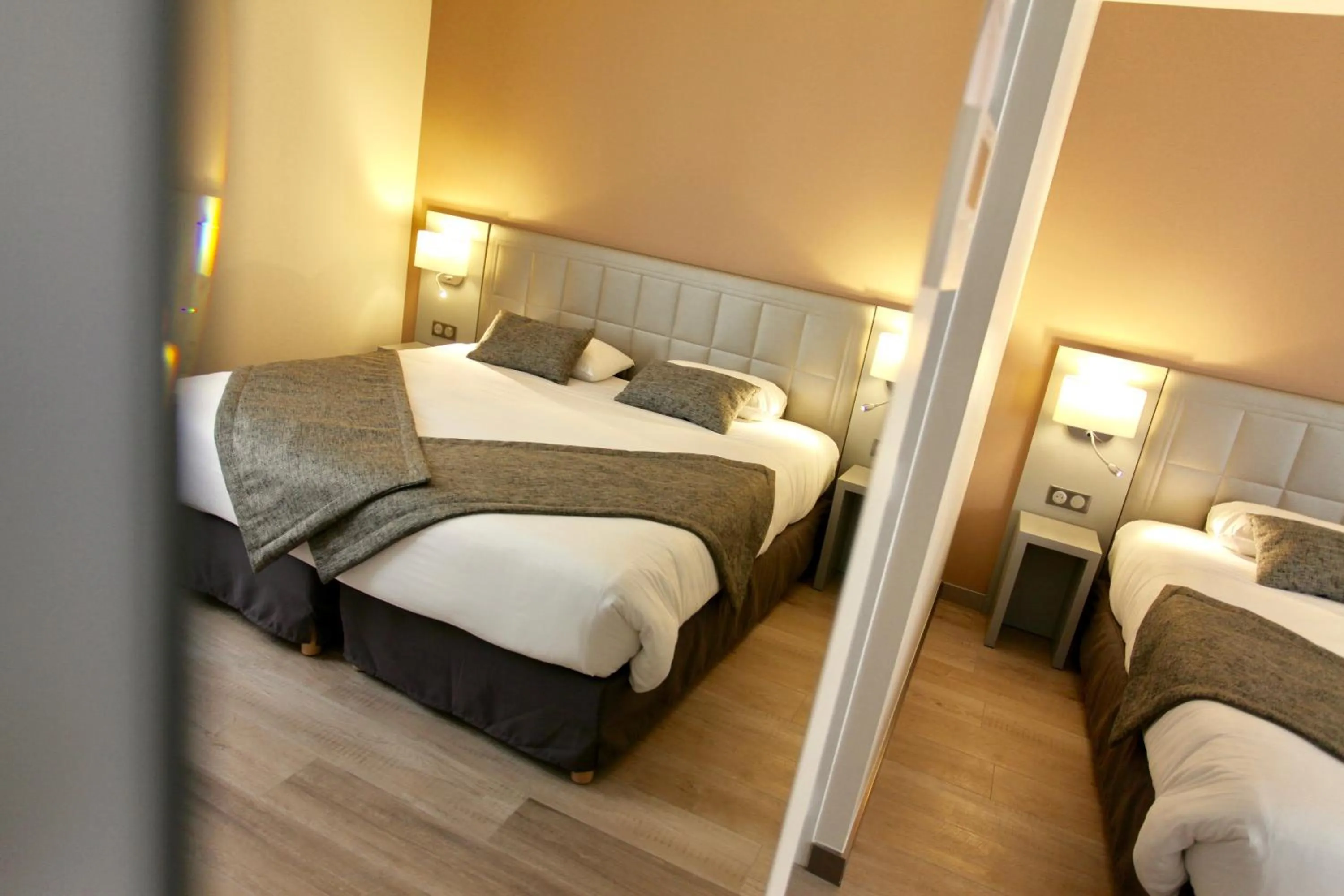 Bed in Logis Hôtel Restaurant Le Moulin de la Coudre