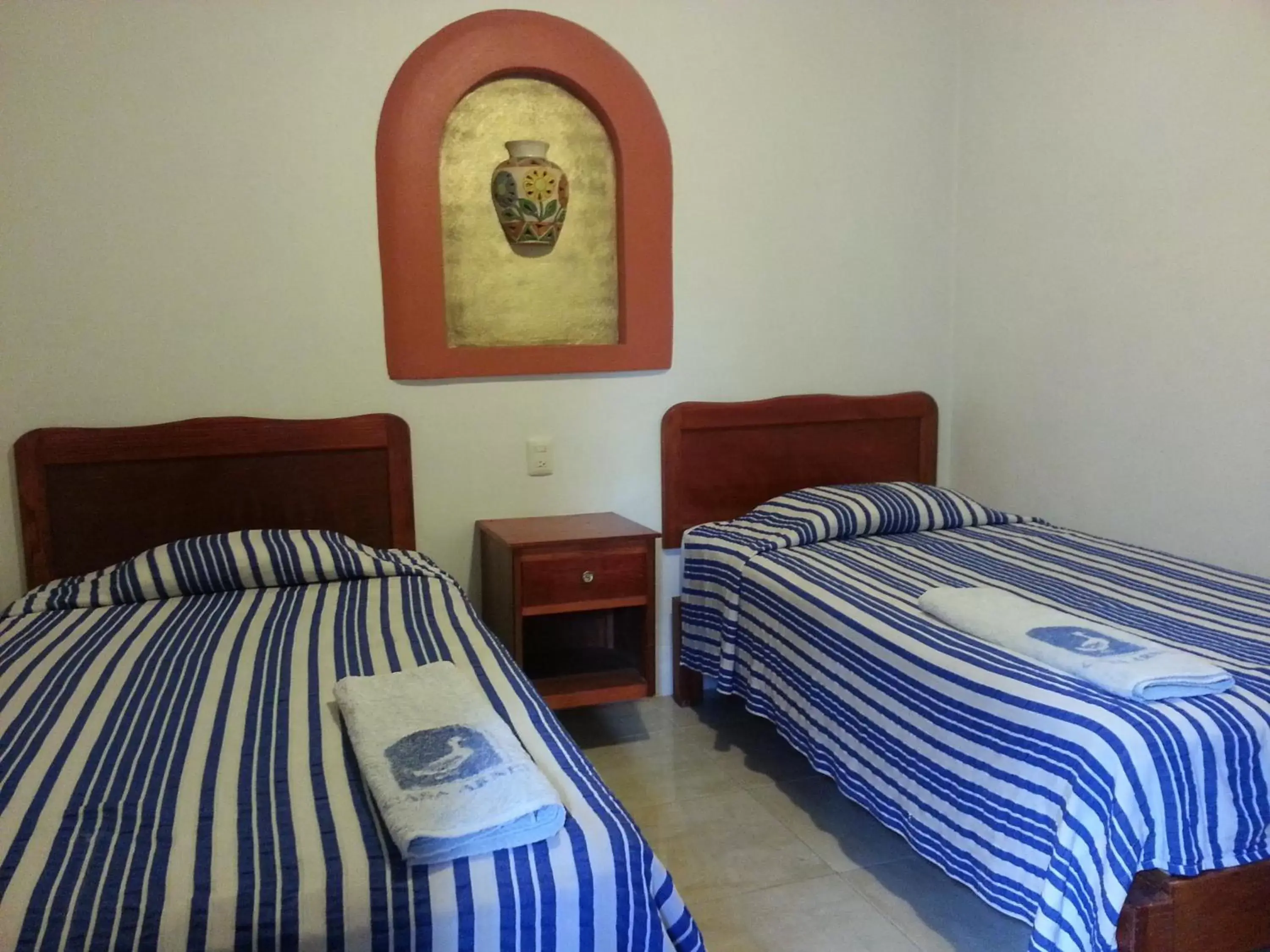 Bed in Hotel Casa Arnel